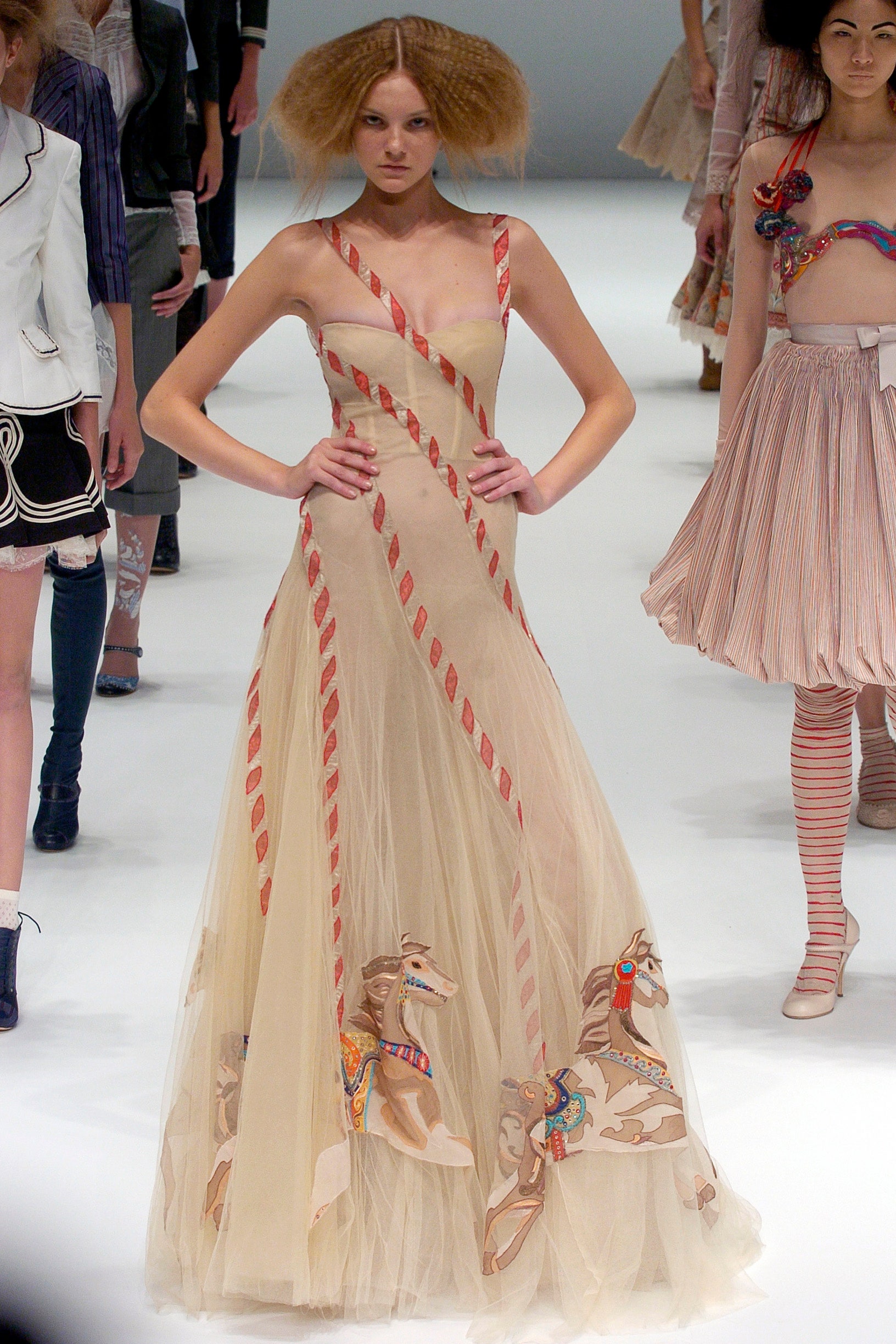 beige flowing embroidered gown