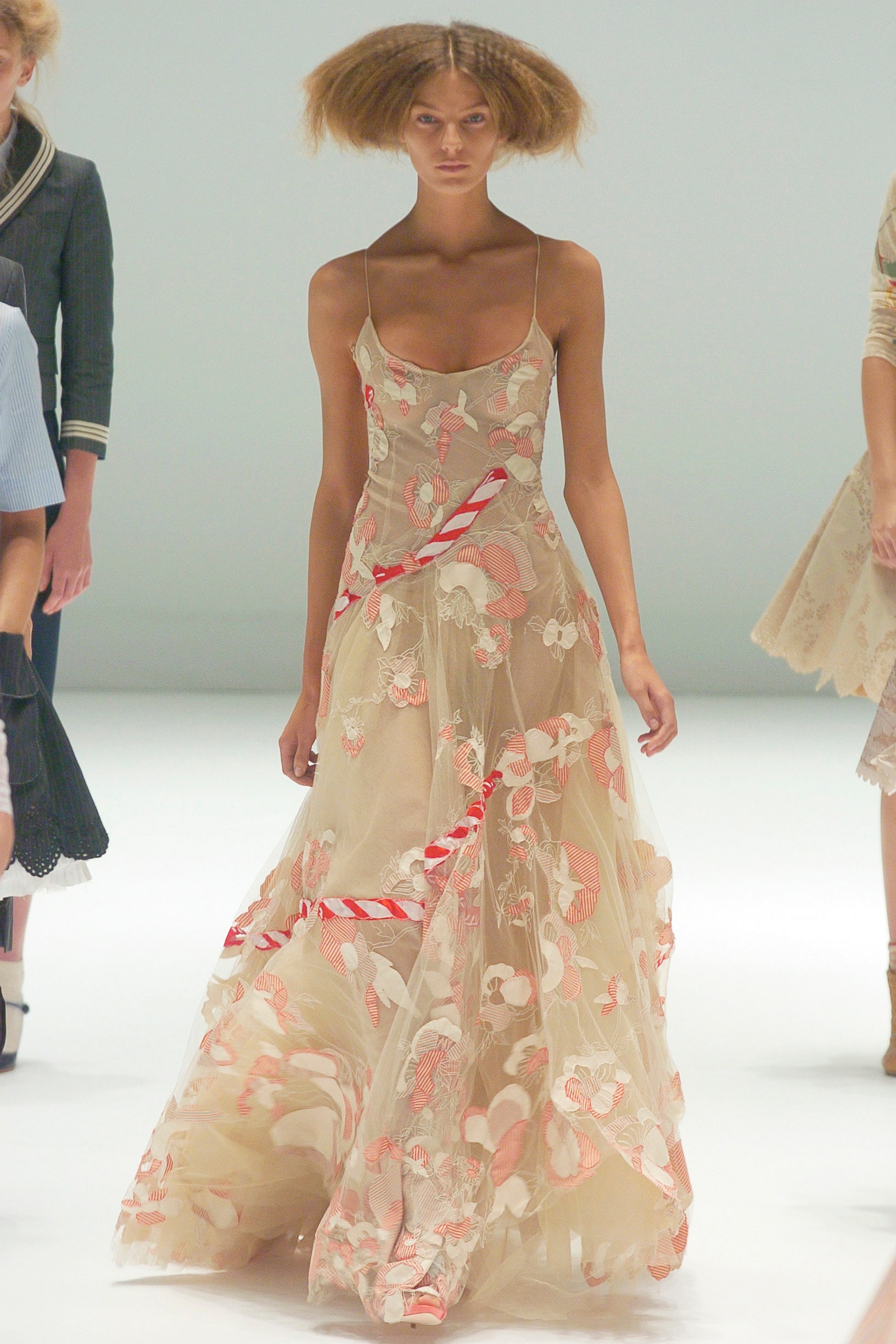 beige embroidered flowing gown