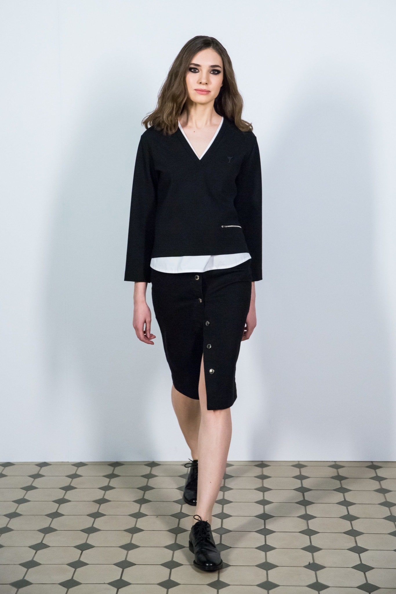 black fitted top and skirt