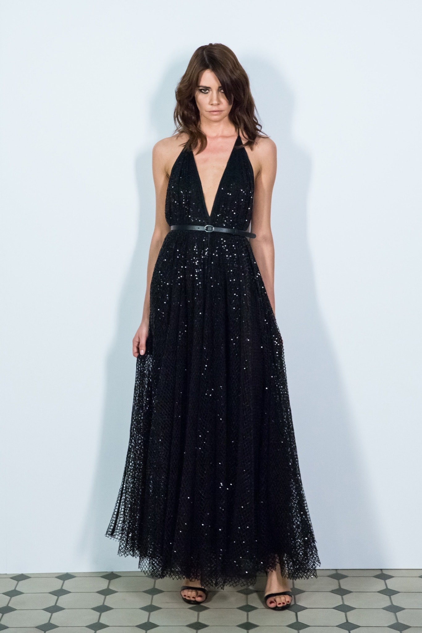 black sequined sleeveless gown