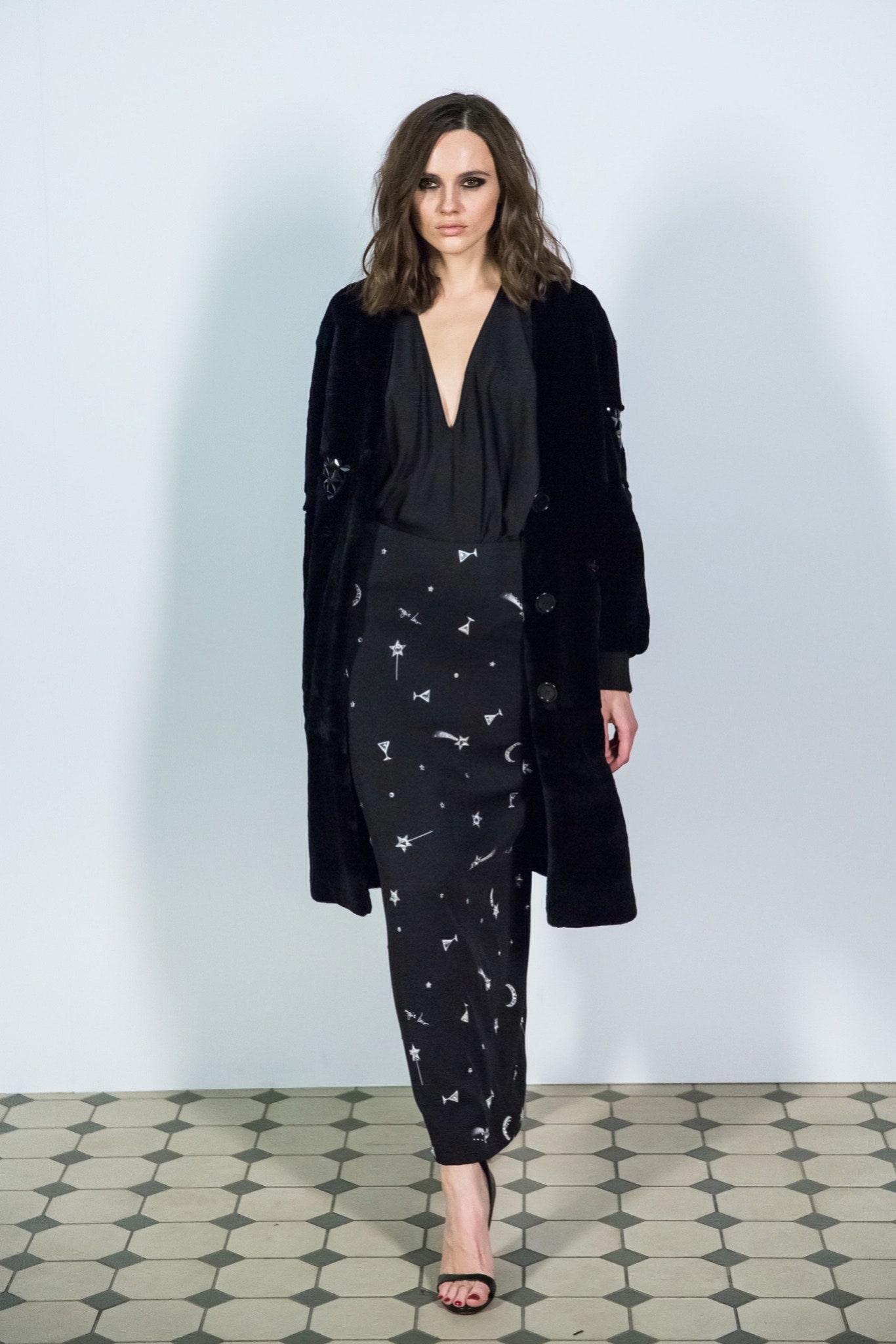 black faux-fur coat and silk blouse