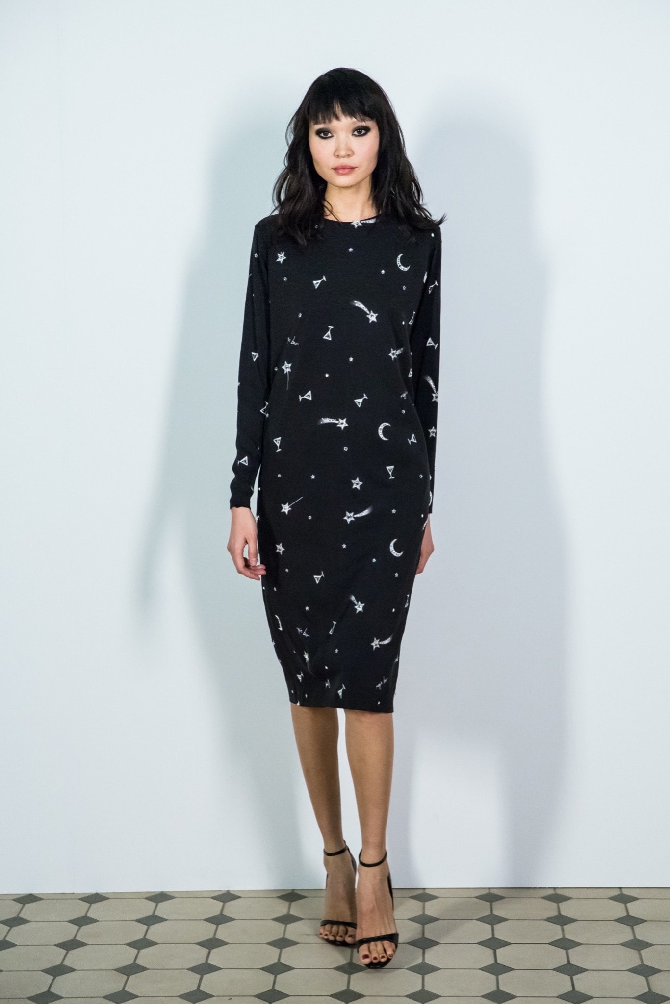 black printed midi dress with strappy shoes