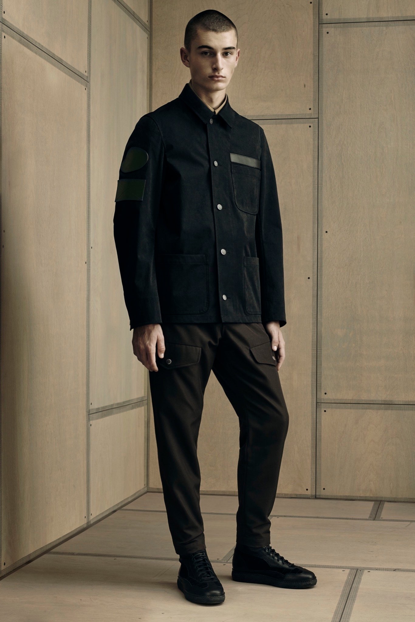 black jacket brown pants