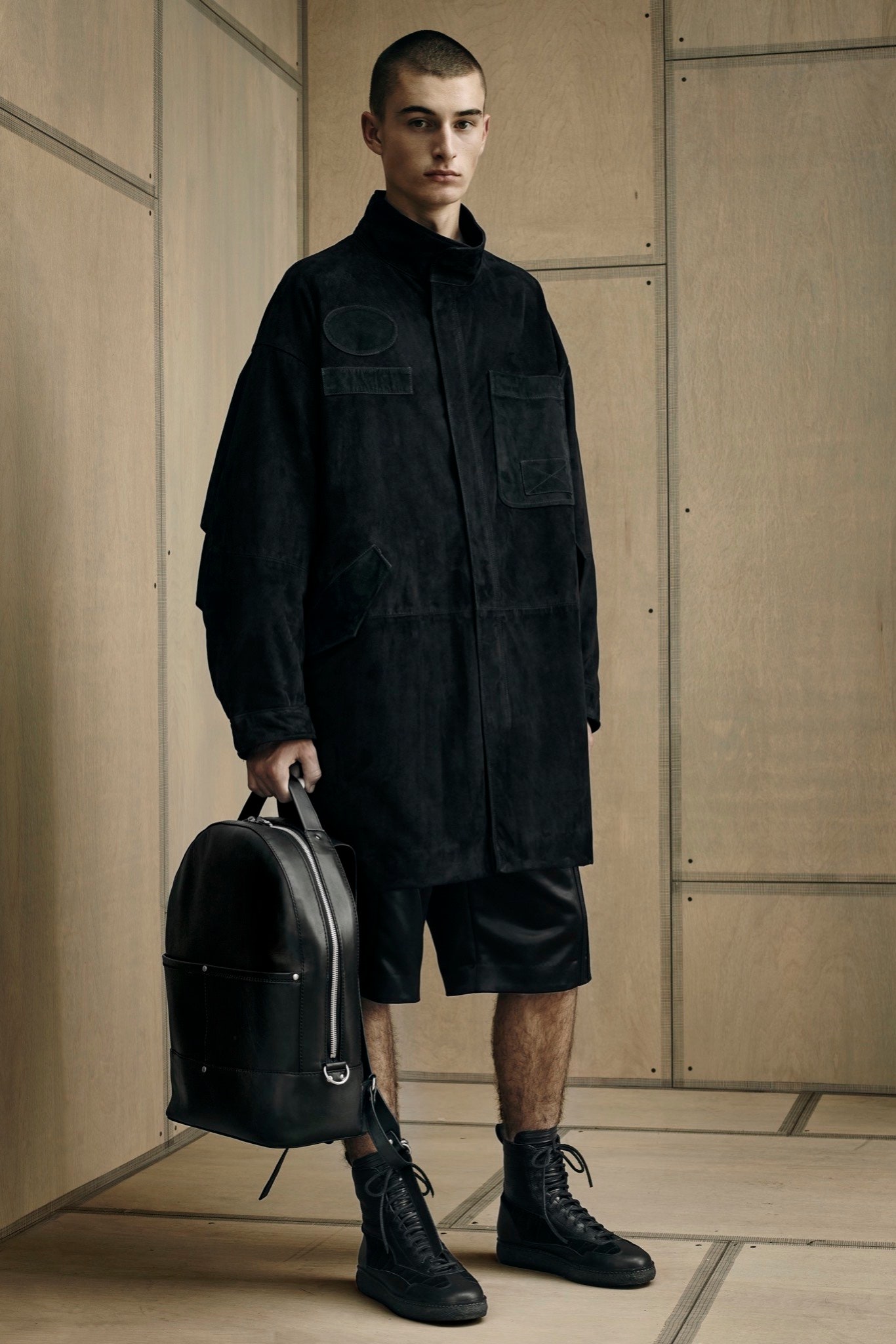 black oversized suede coat with shorts