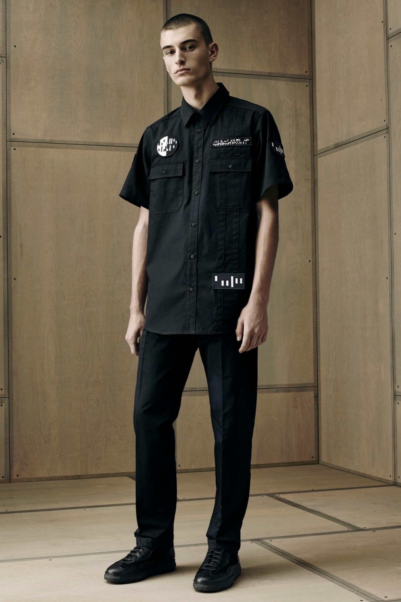 black fitted shirt and pants