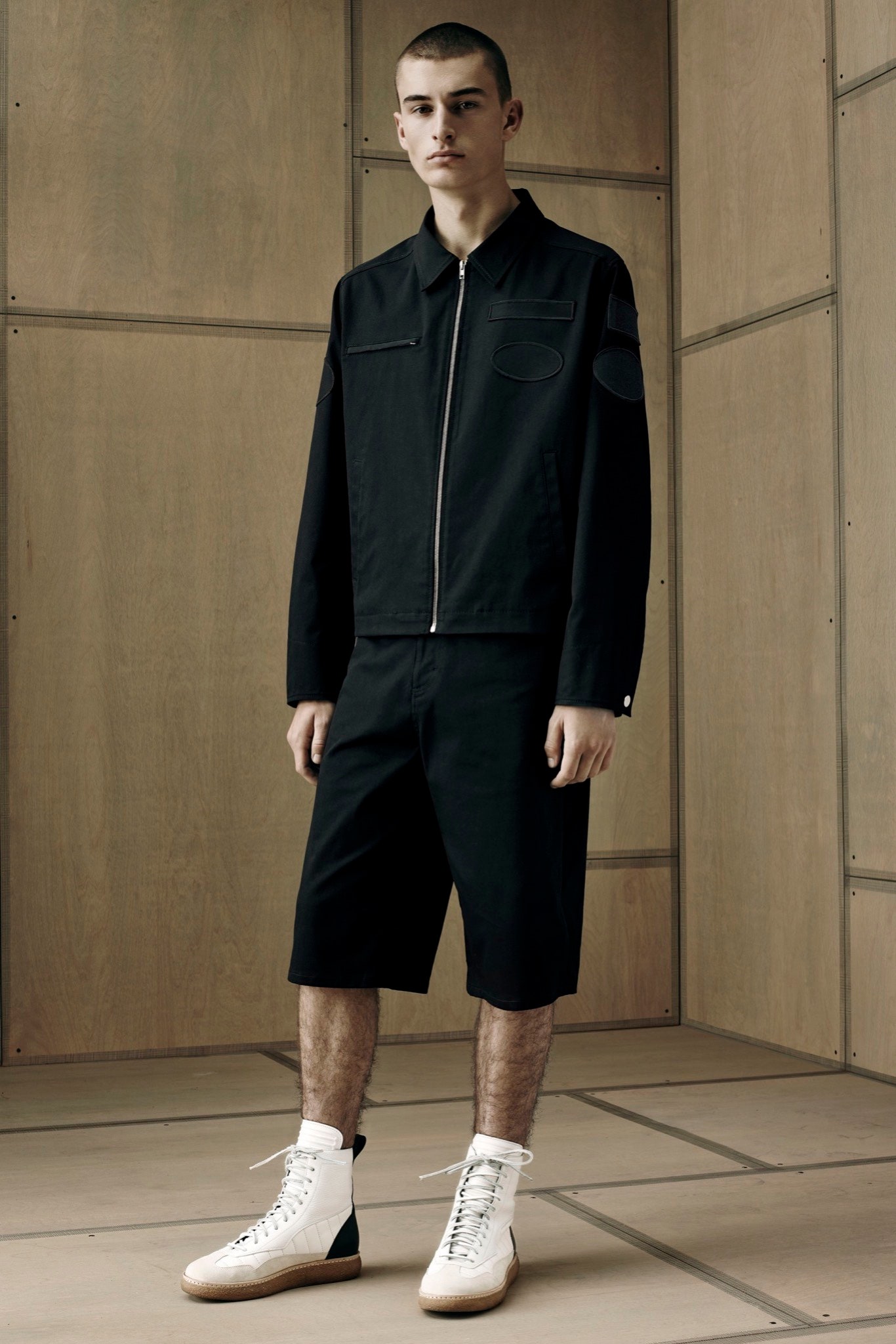 black fitted jacket and shorts