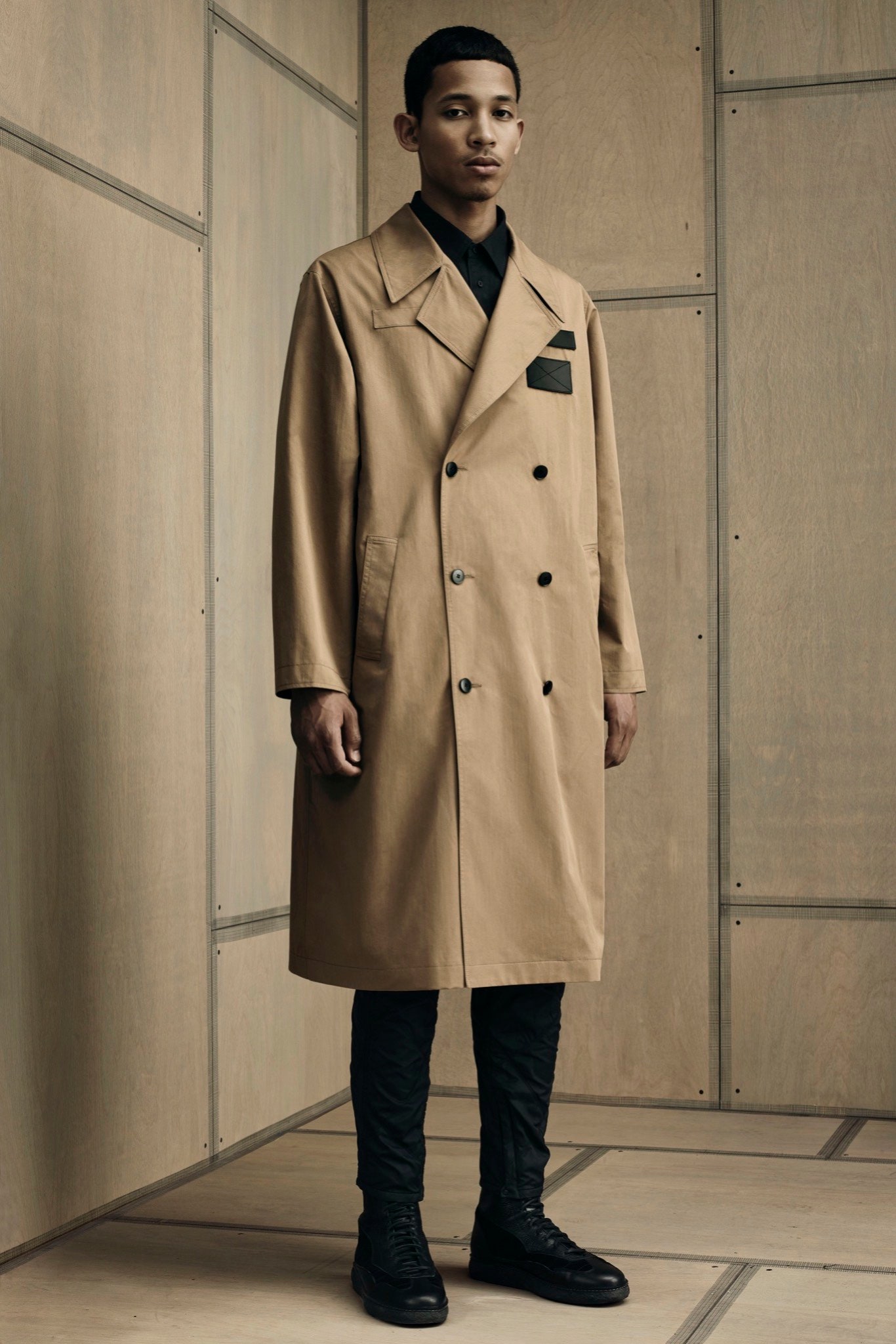 beige cotton coat with black pants