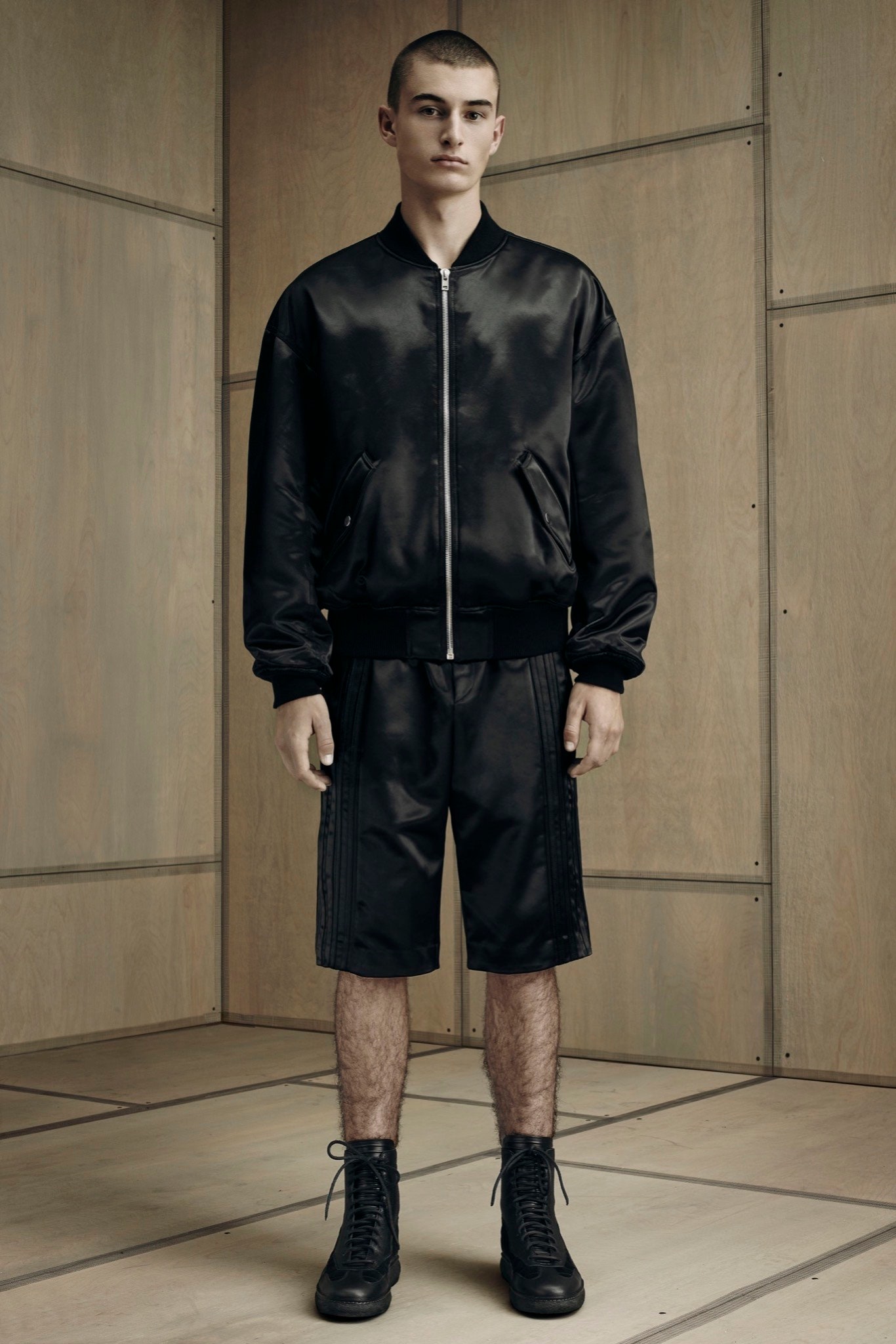 black satin long-sleeve collared fitted zippered shiny jacket