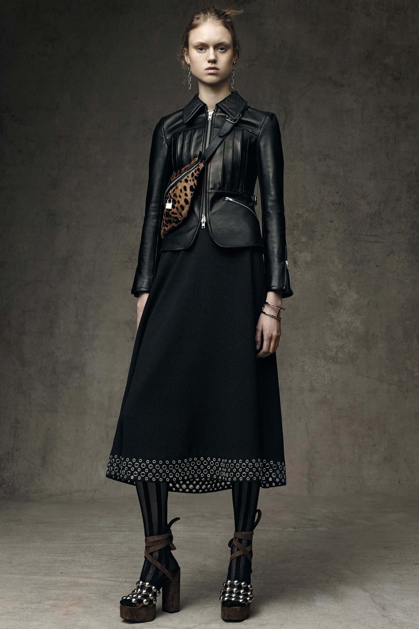 black leather long-sleeve collared fitted structured zippered jacket