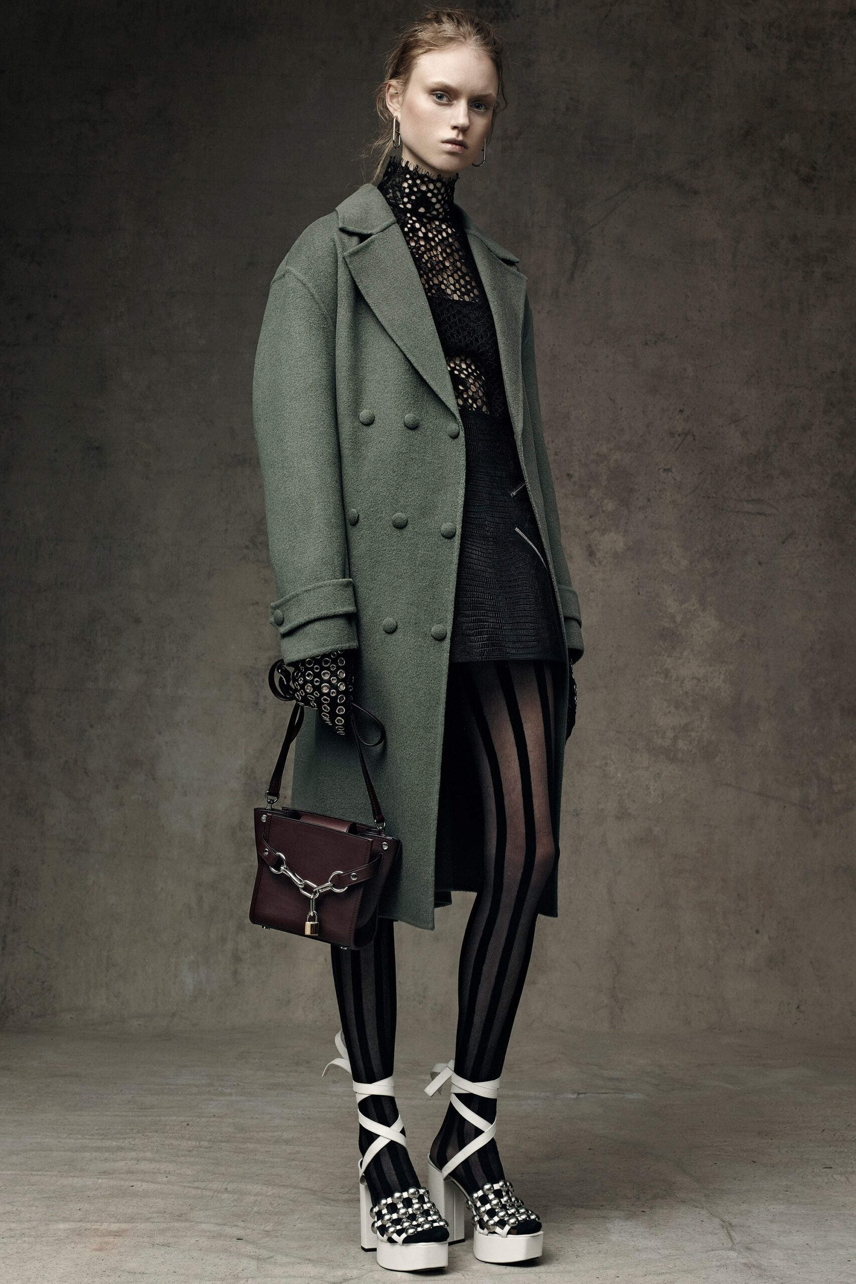 green wool coat with black lace top