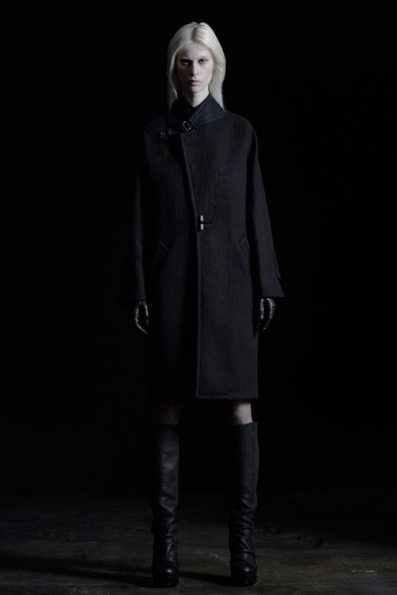 black wool coat with gloves and boots