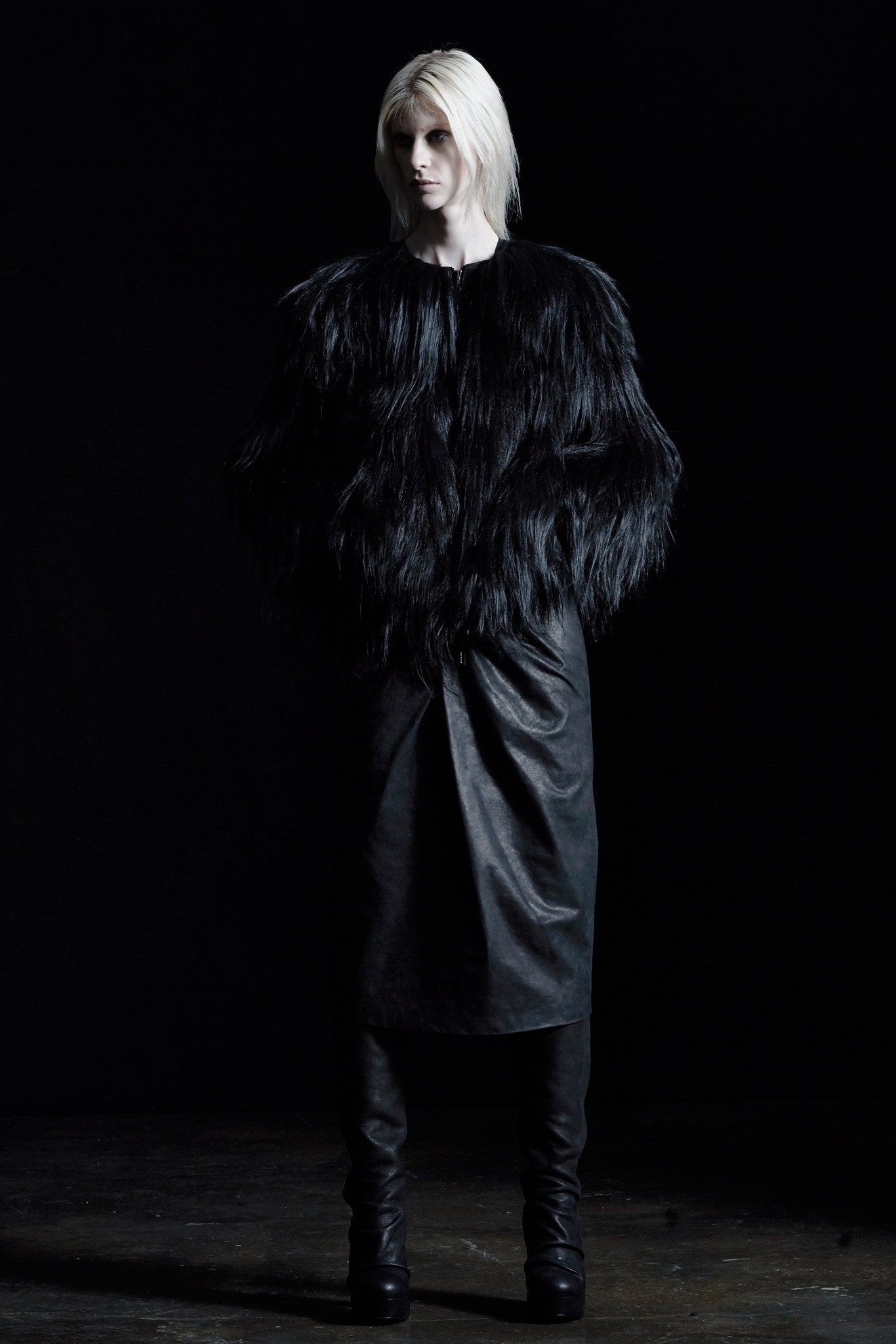 black fur coat and leather skirt