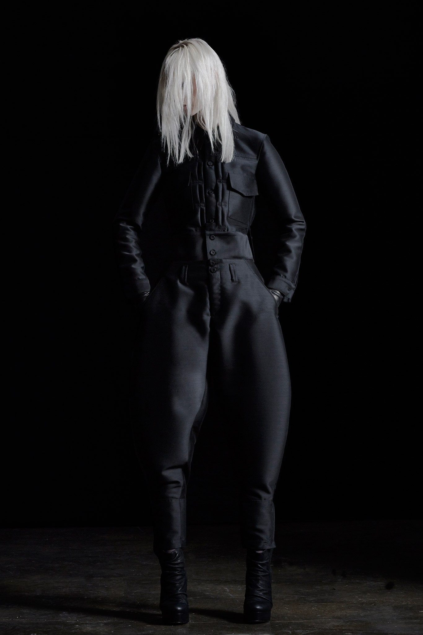 black silk fitted jacket and relaxed pants