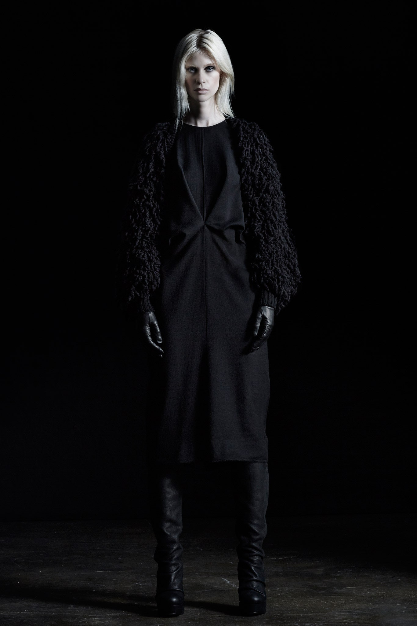 black fitted midi dress with oversized coat