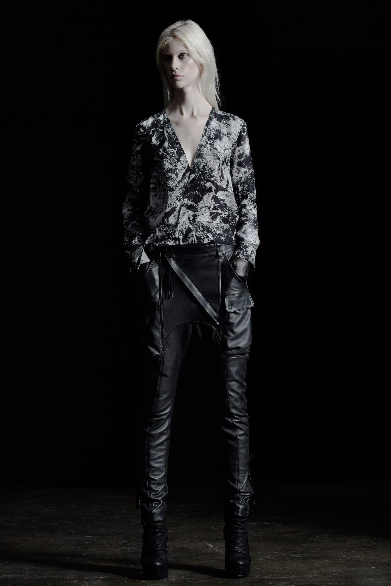 black and white printed top with leather pants