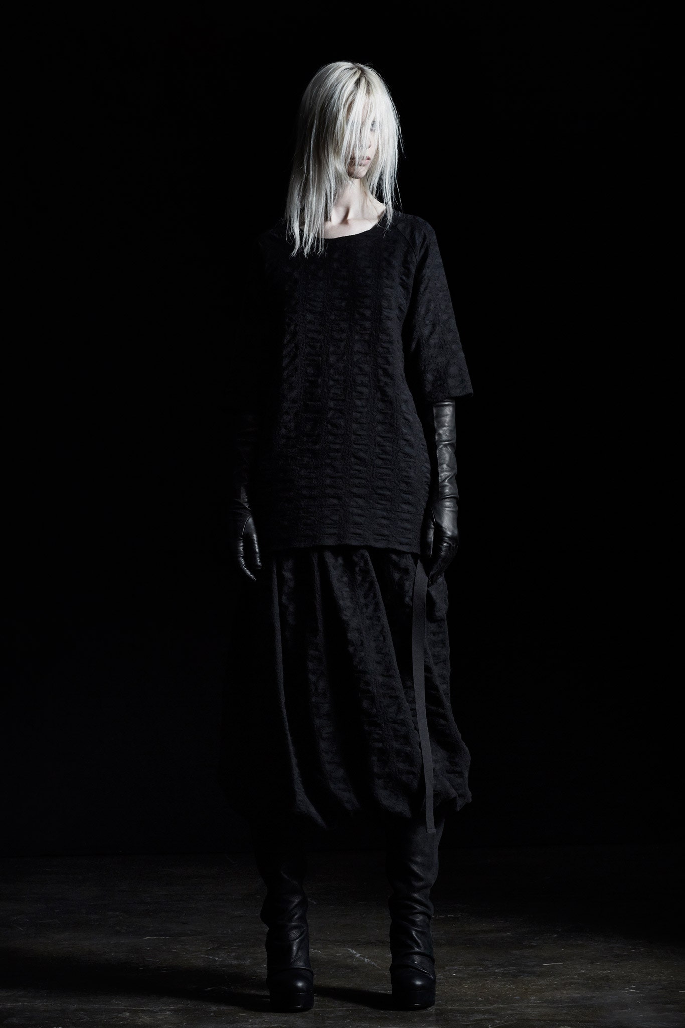 black relaxed top with asymmetric skirt