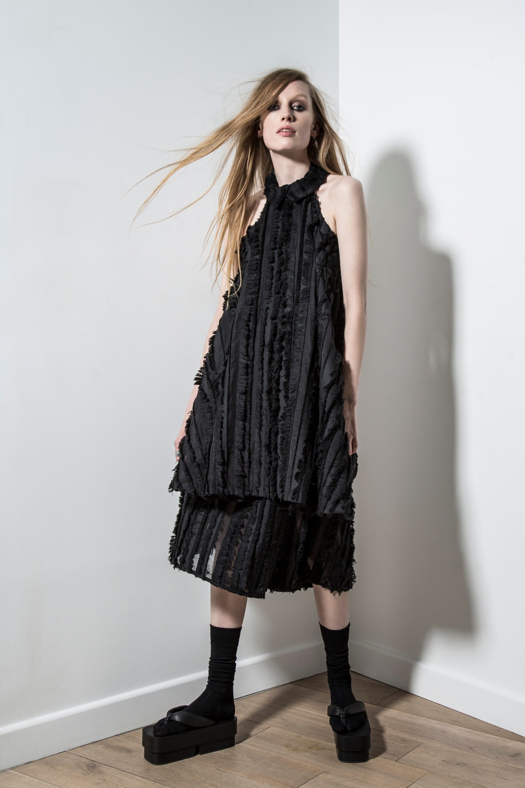 black pleated midi dress