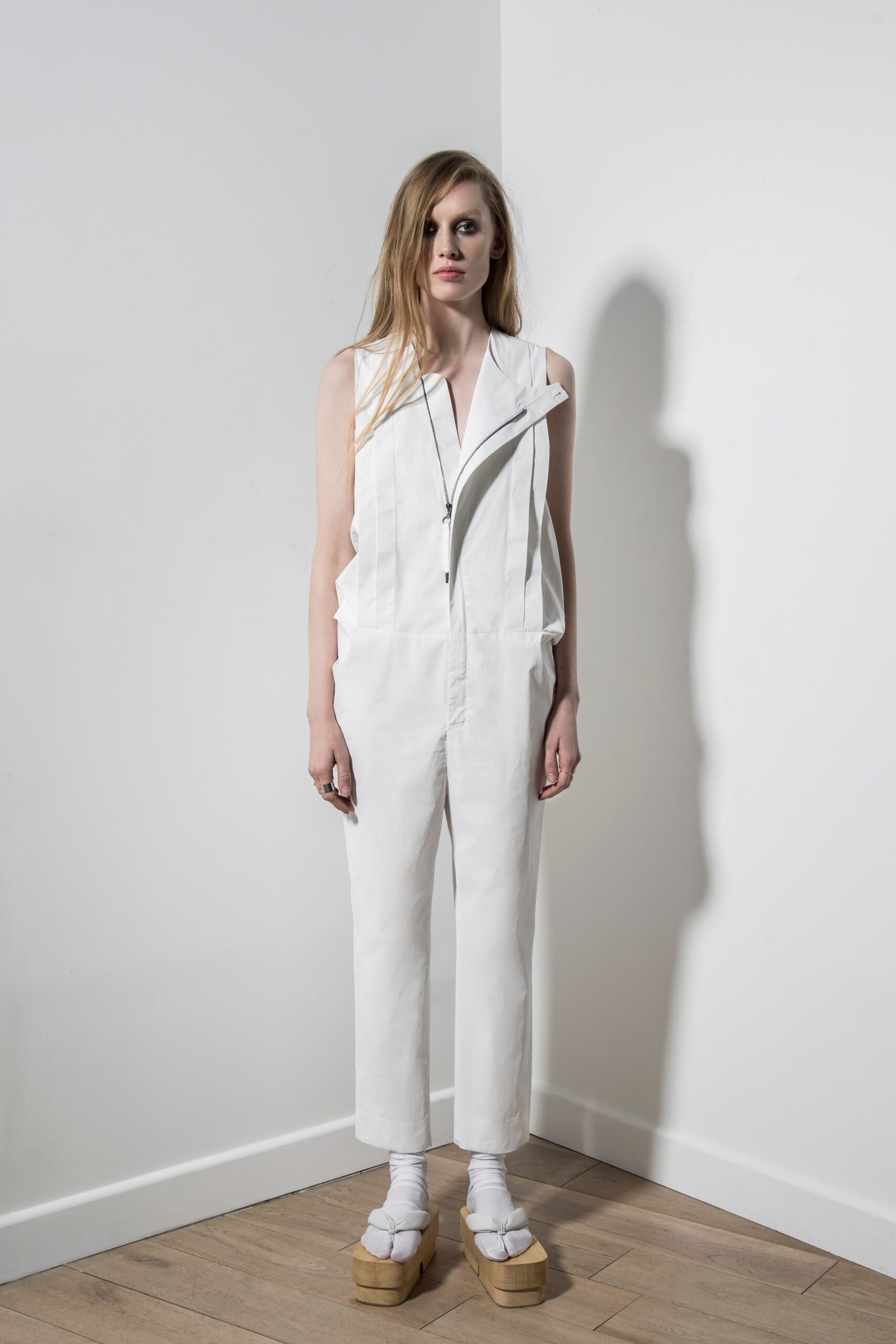 white fitted sleeveless jumpsuit