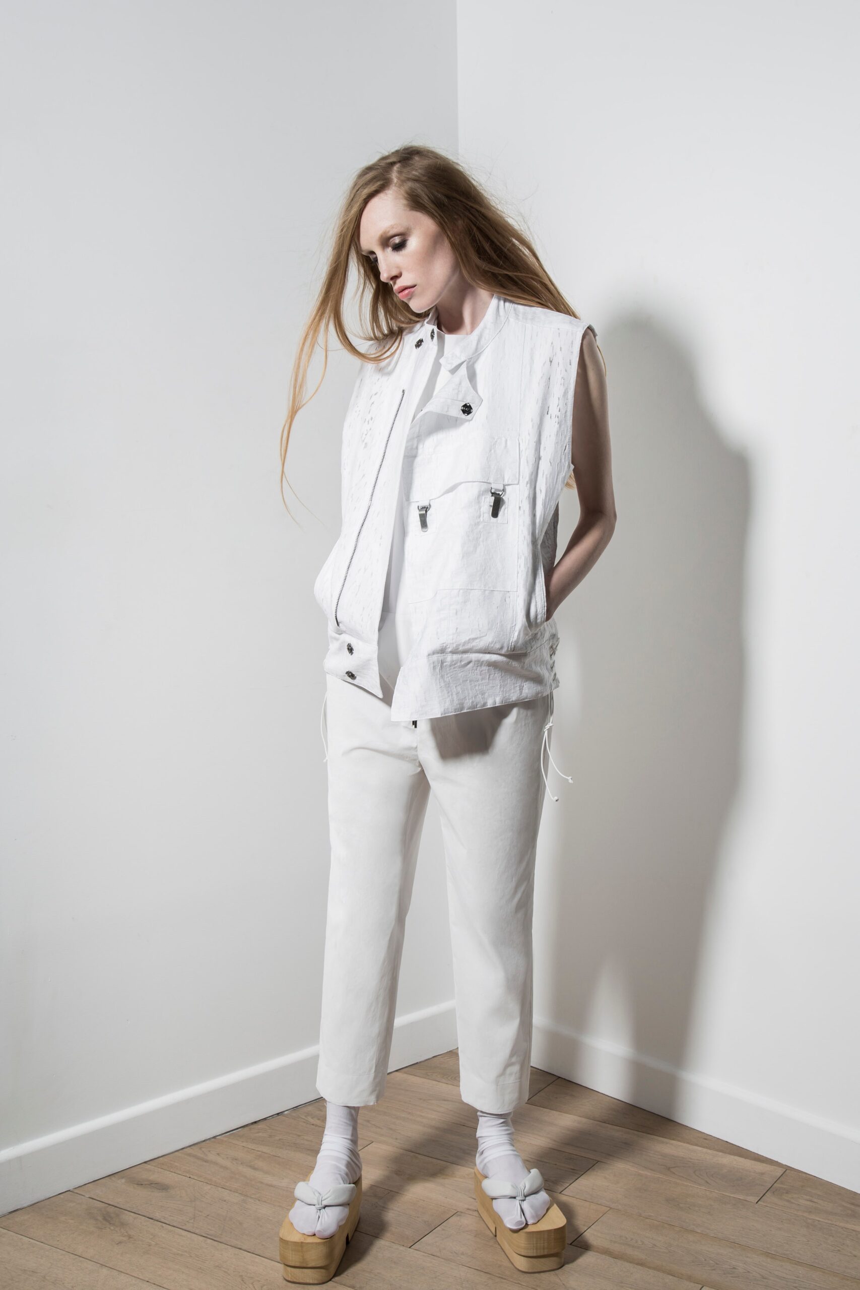 white relaxed vest and pants