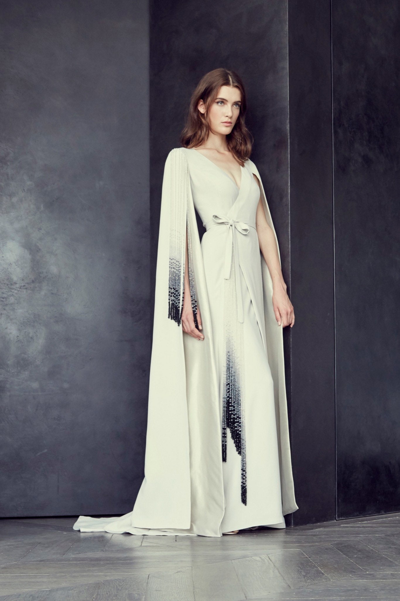 white silk sleeveless v-neck fitted draped belted gown