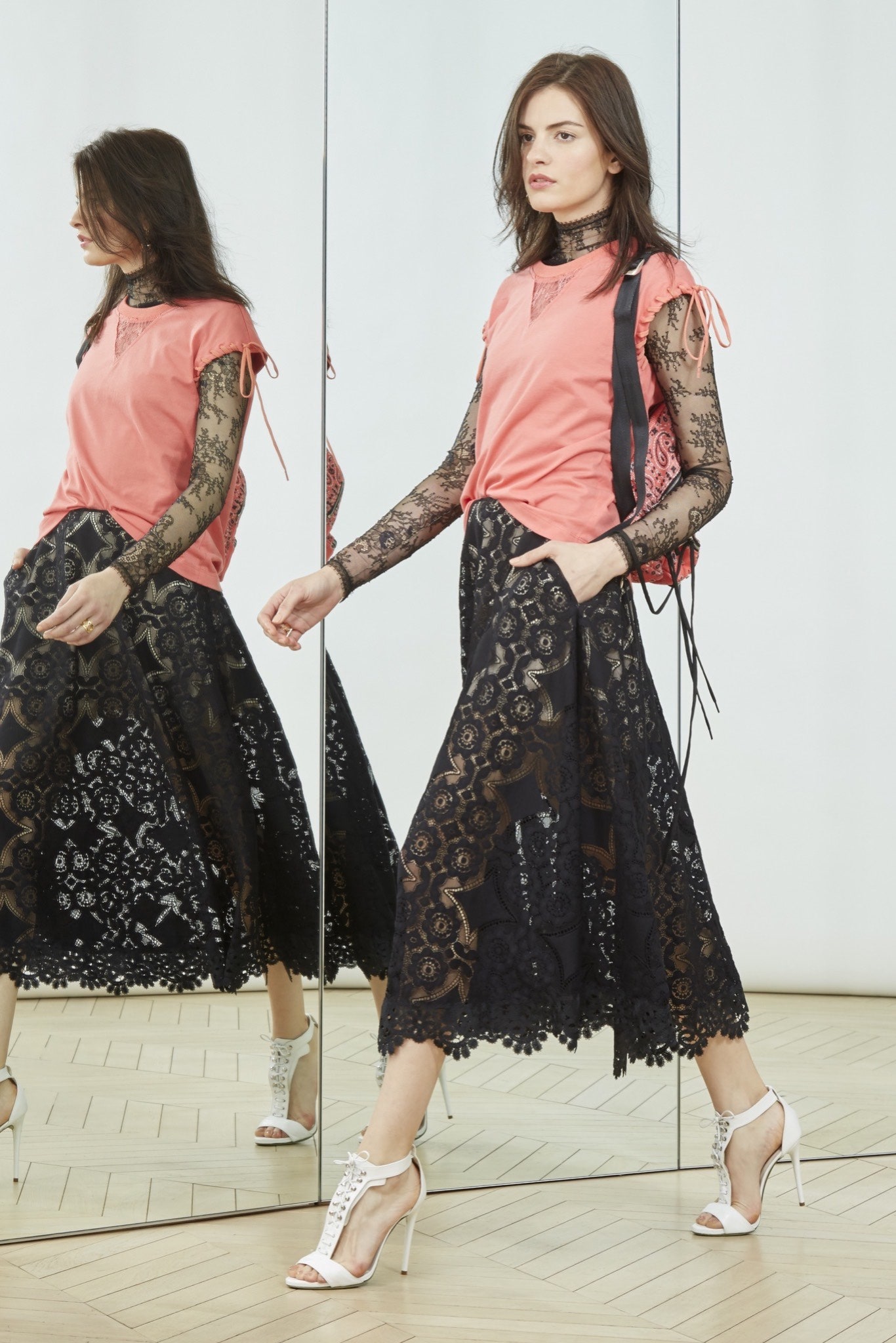 pink relaxed top with black lace skirt