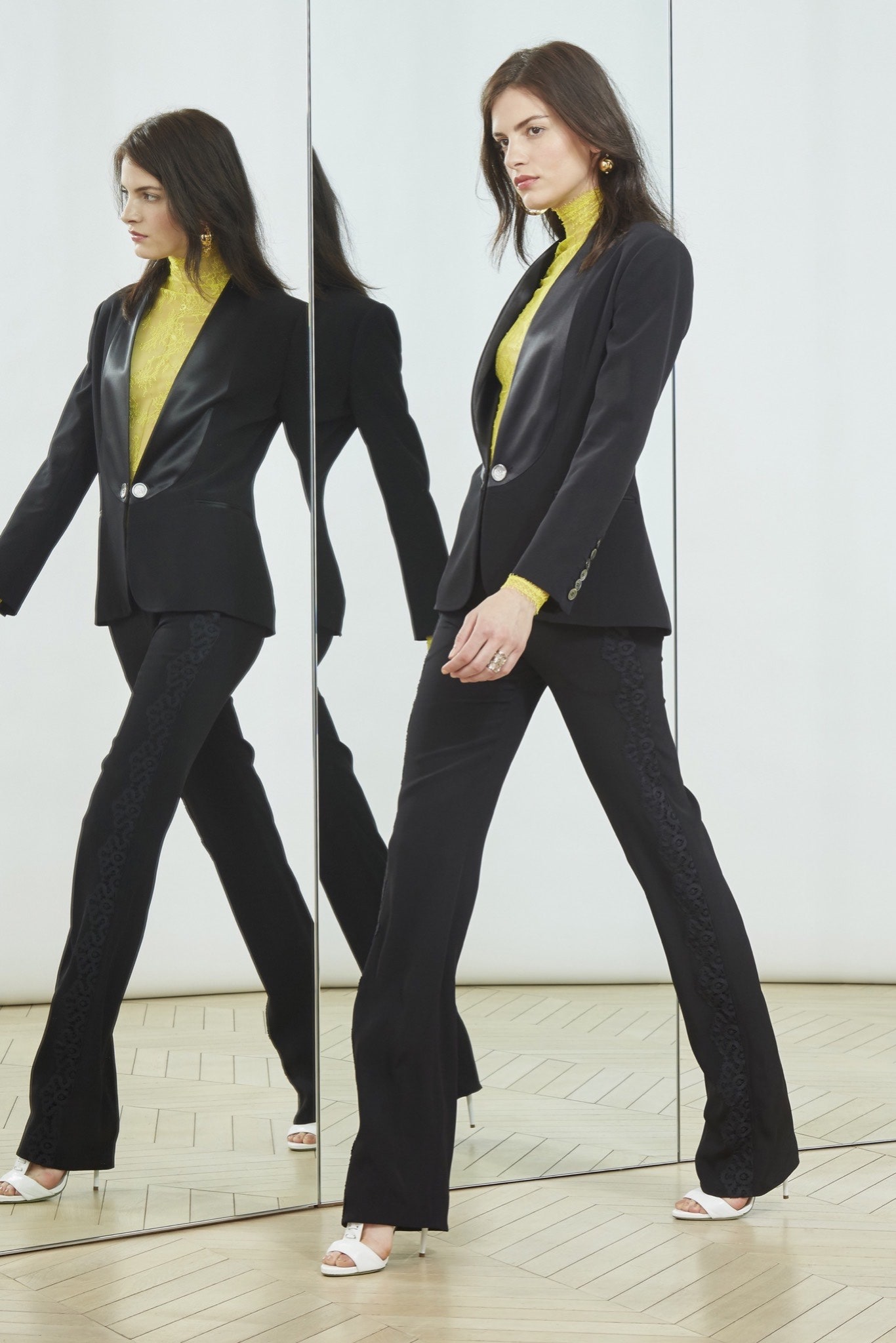 black tailored blazer with flared pants