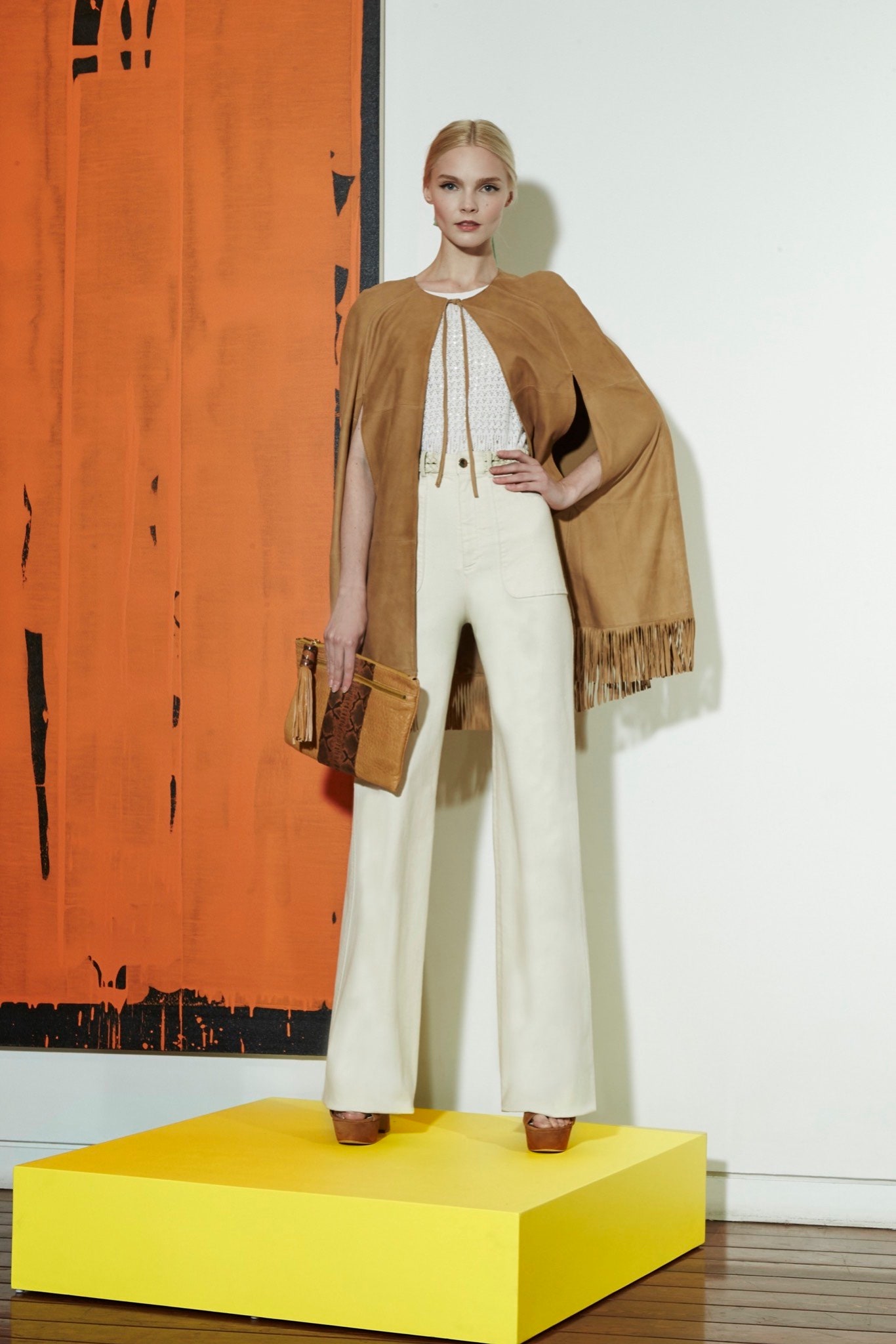 brown suede cape with beige pants