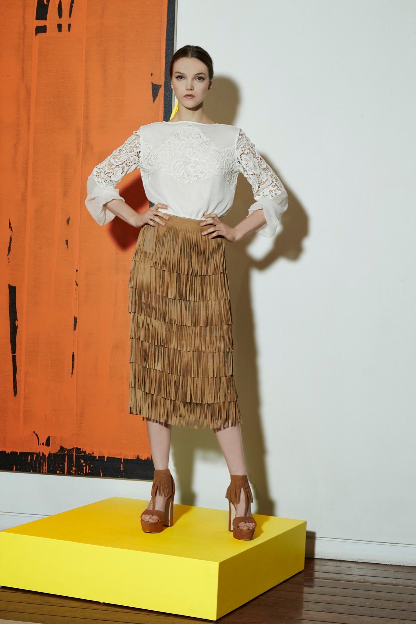 white lace blouse with fringed skirt