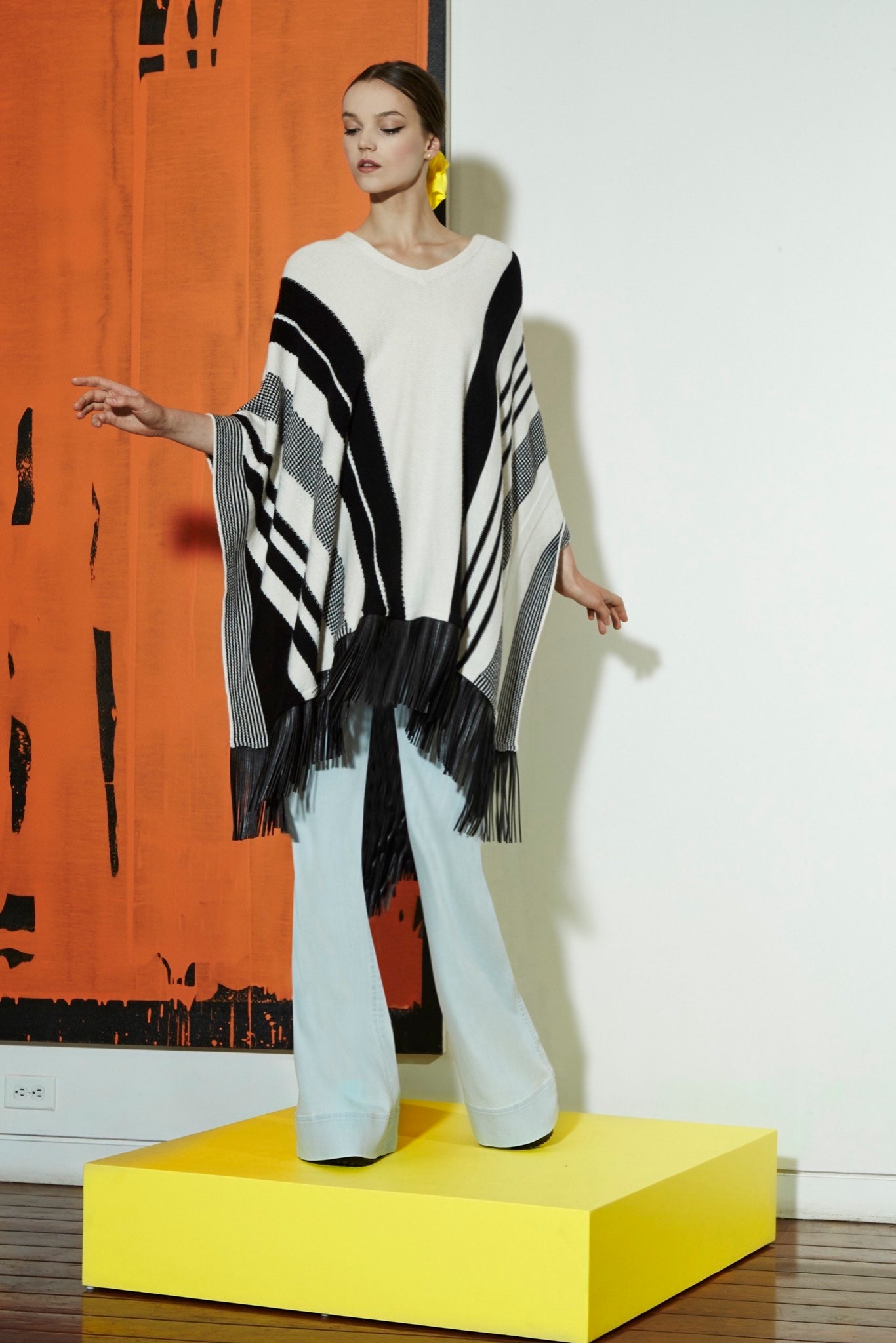 striped poncho with flared pants