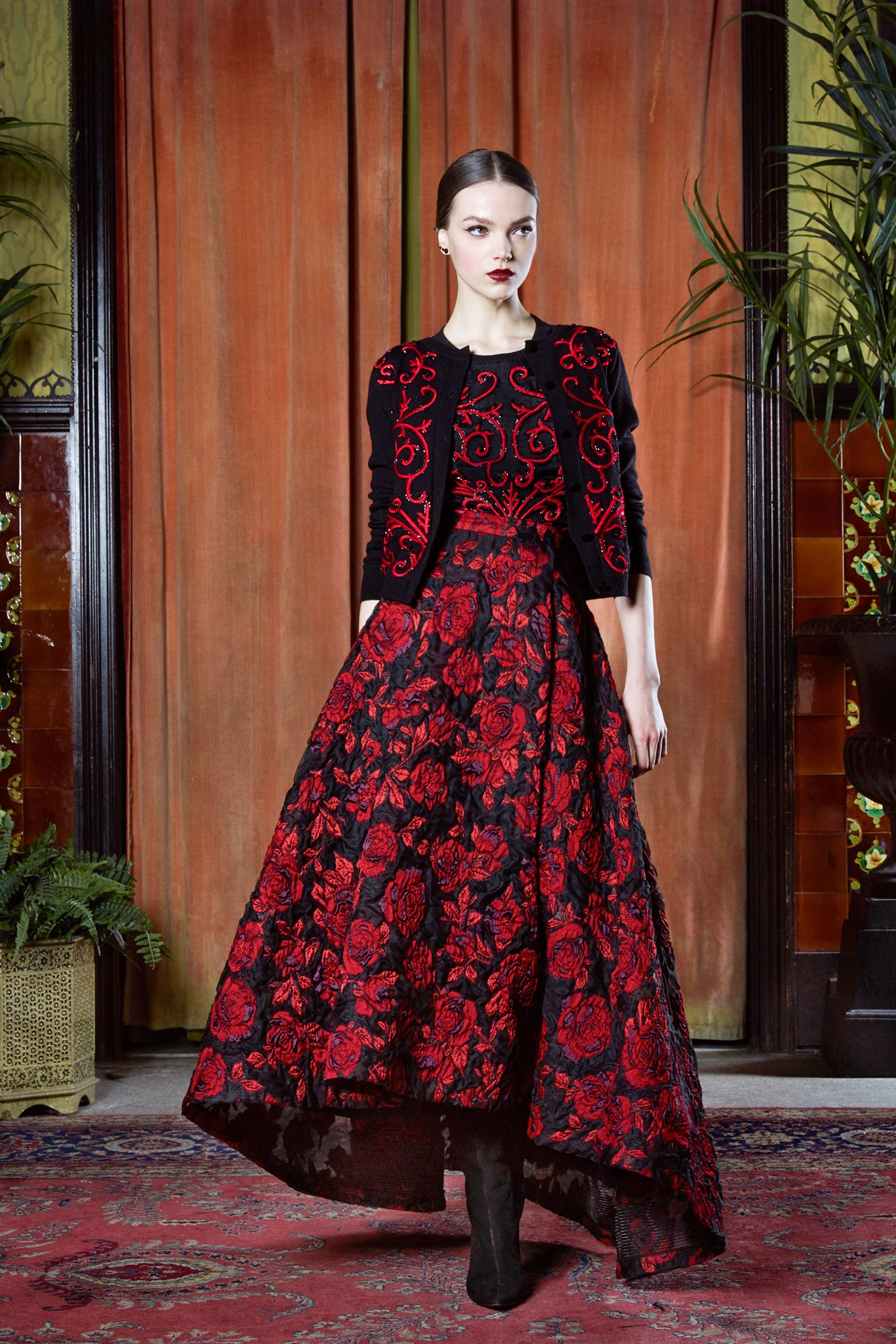 red silk sleeveless high-neck fitted flared embroidered gown