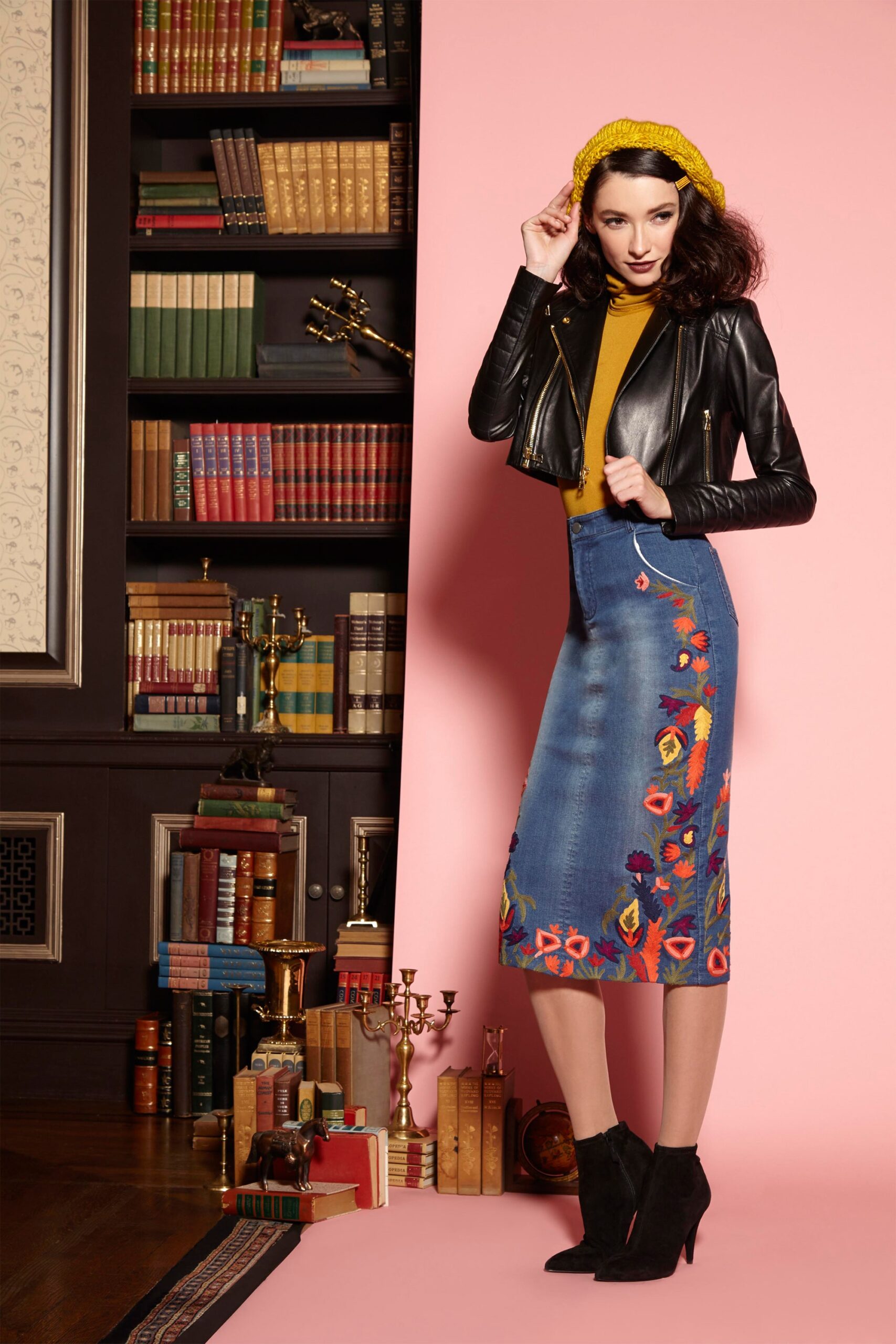 black leather jacket with yellow top