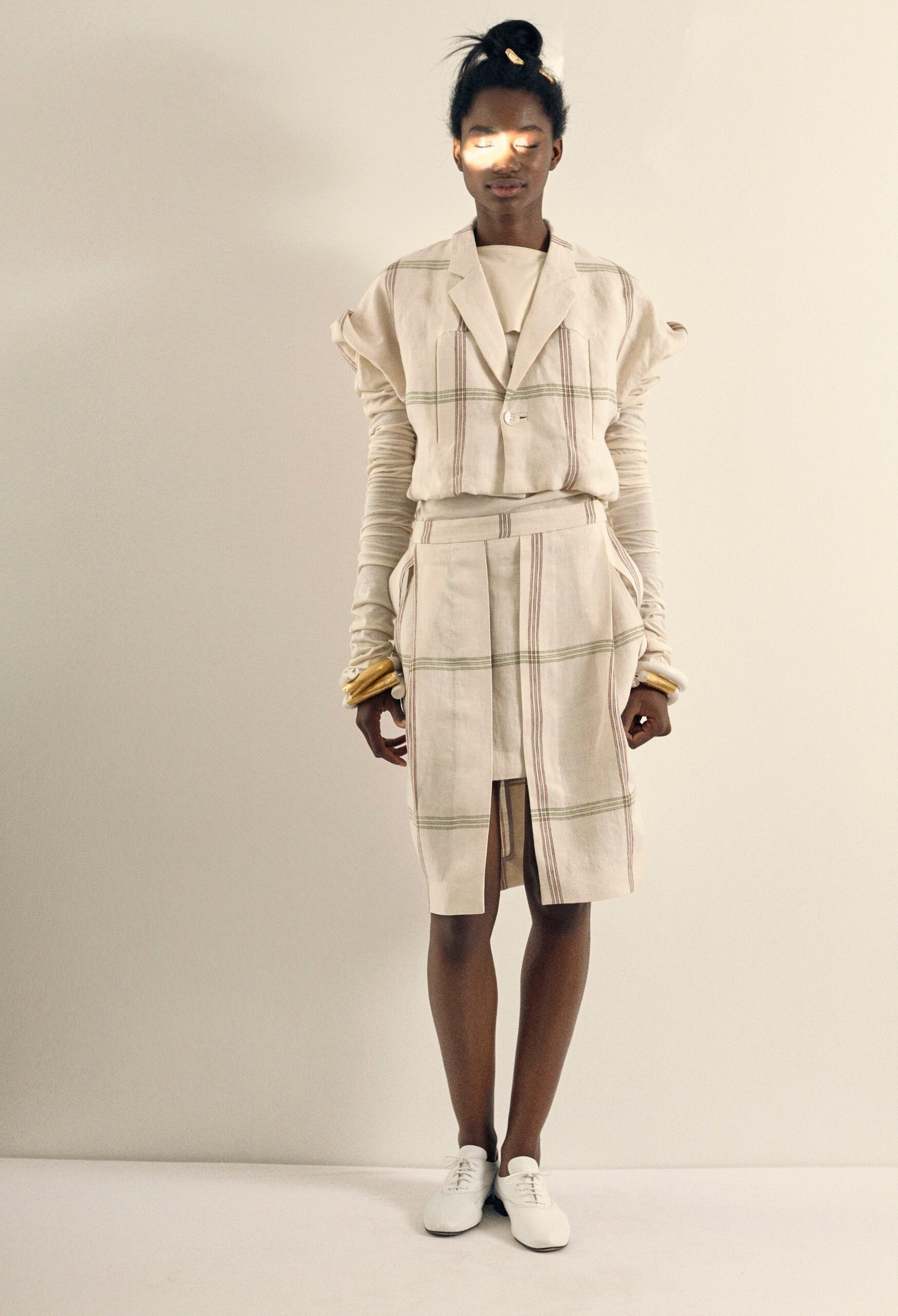 beige fitted blazer and skirt