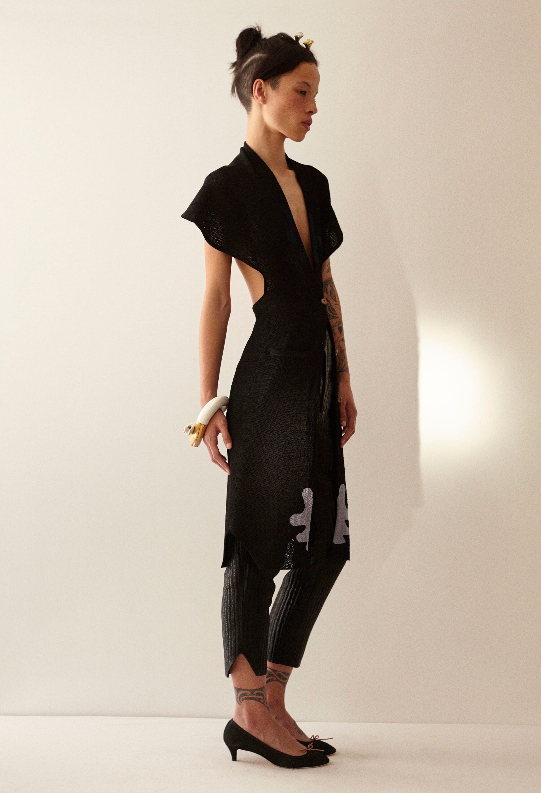 black fitted dress with slim pants
