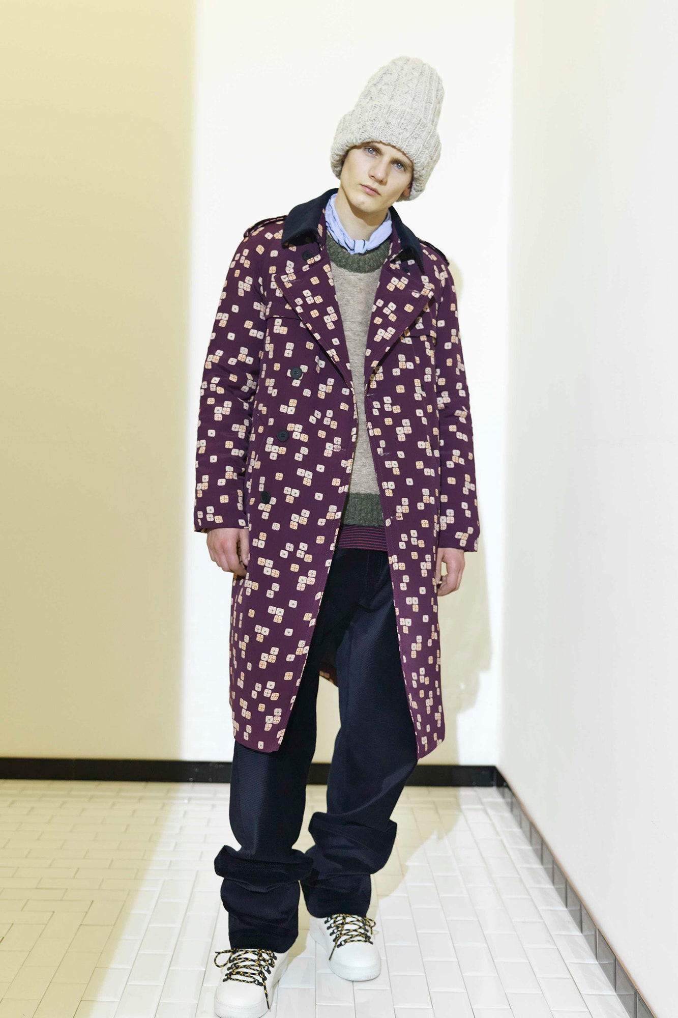 purple printed coat with gray sweater