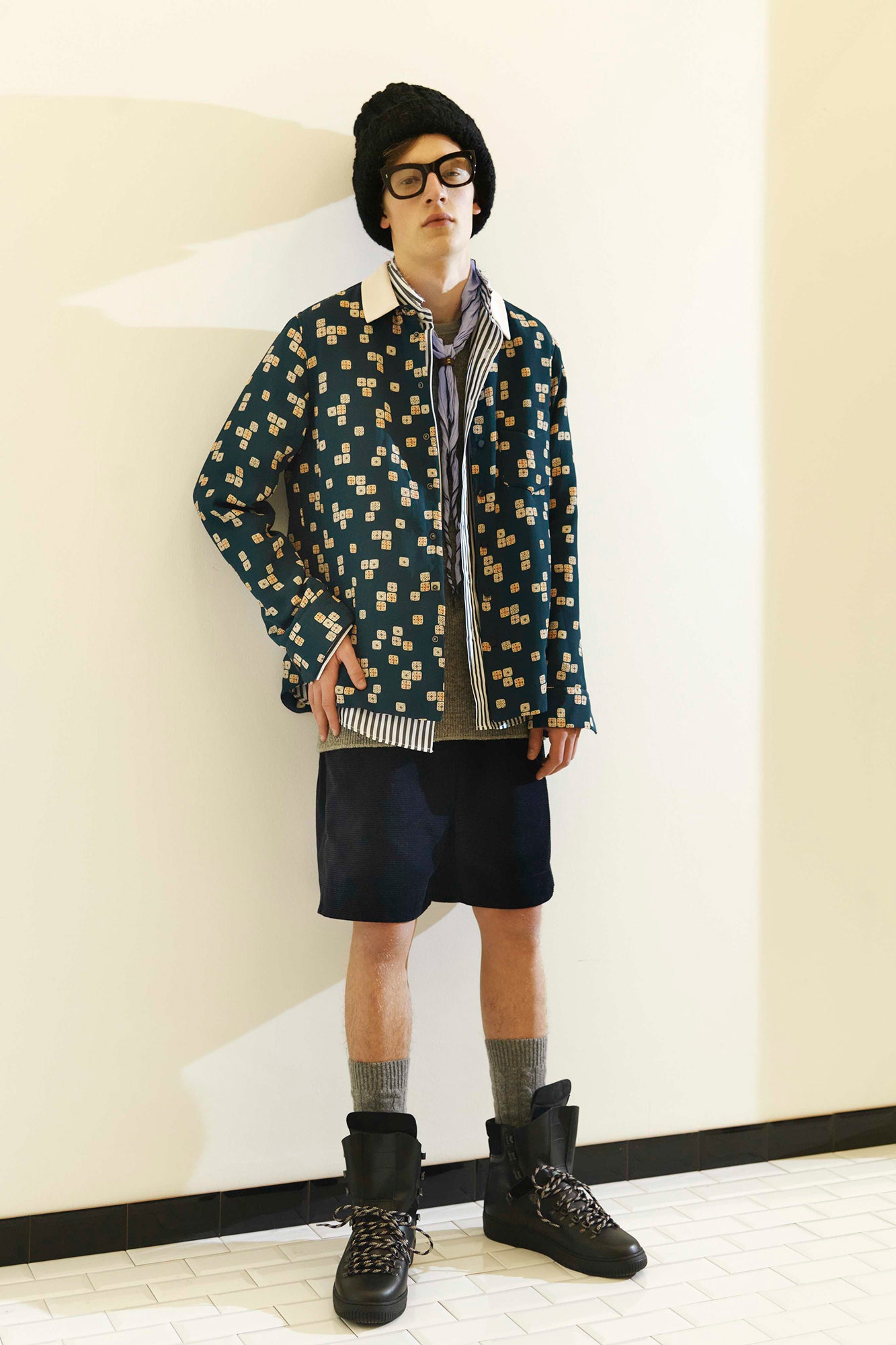 blue printed jacket with black shorts