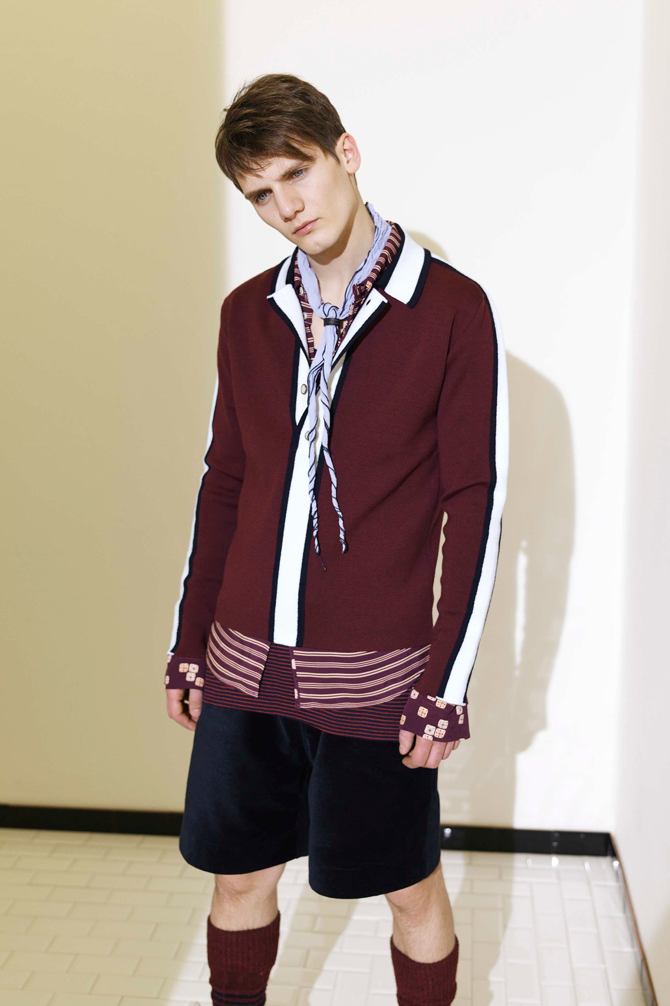 maroon relaxed shirt with black shorts