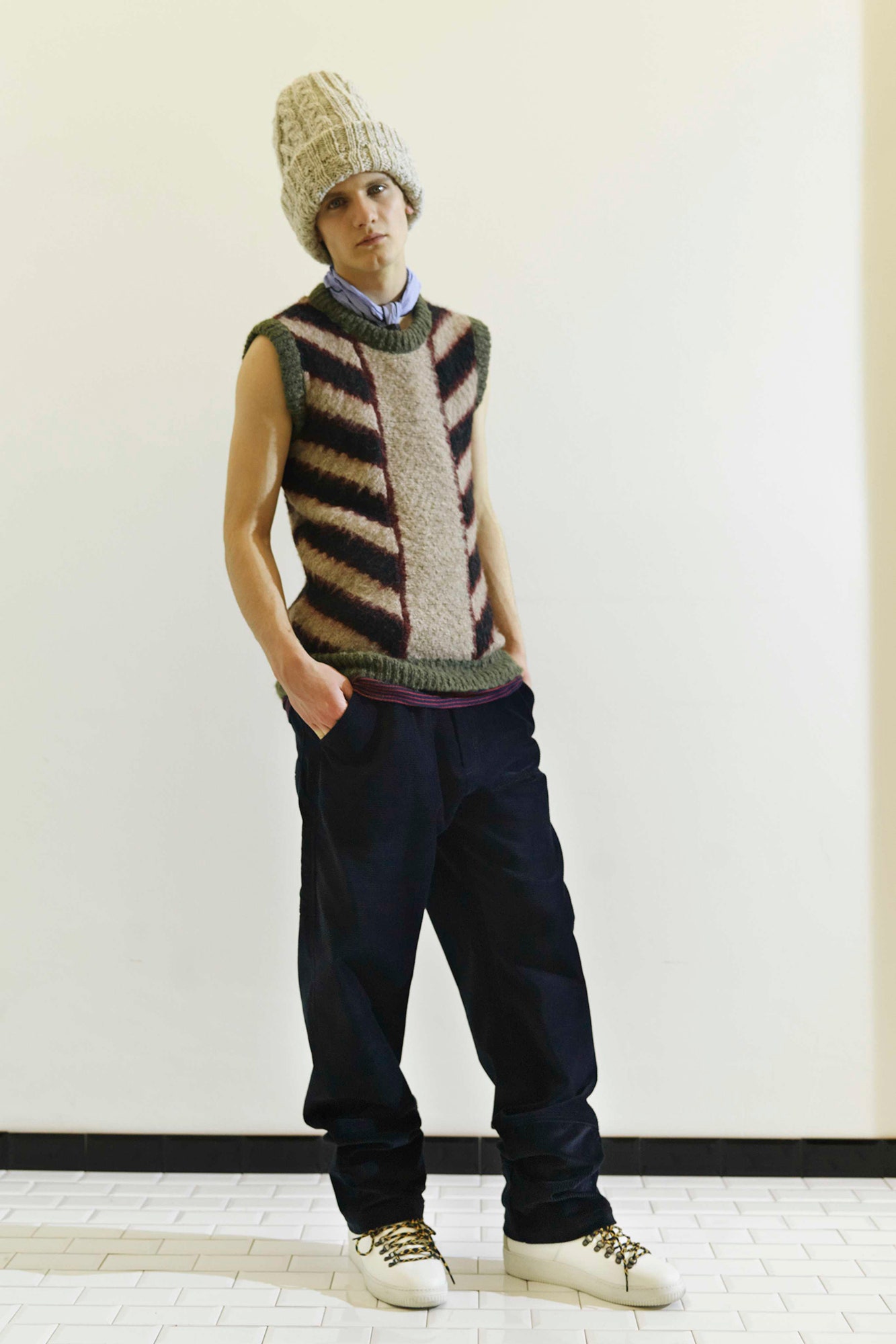 relaxed brown striped sweater with black pants