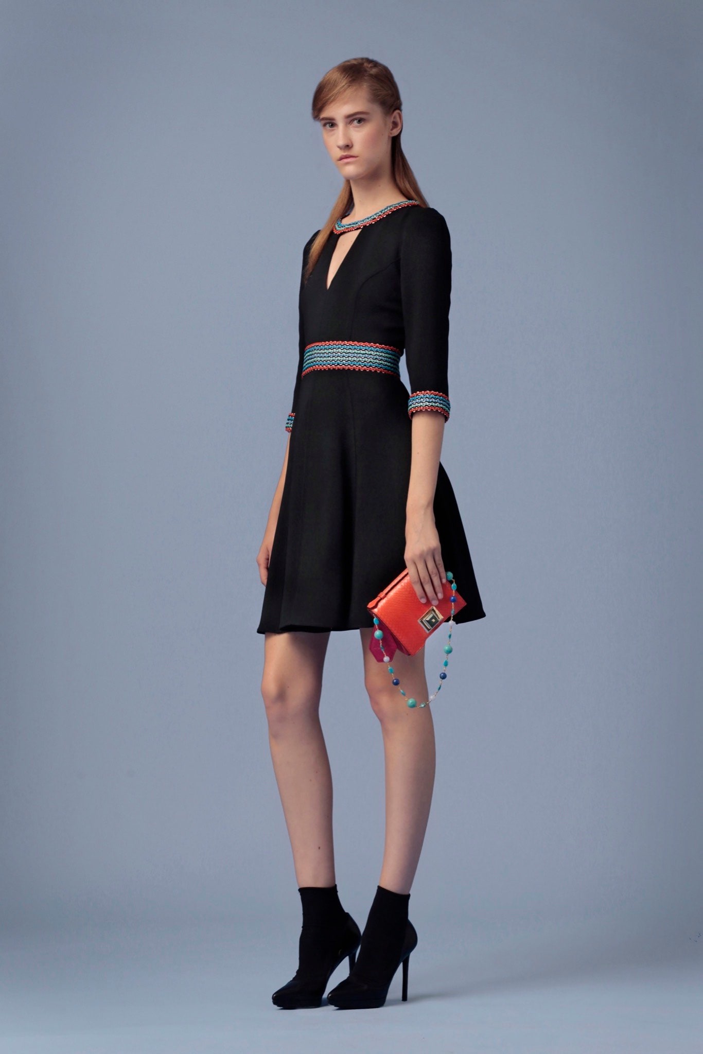 red leather zippered clutch