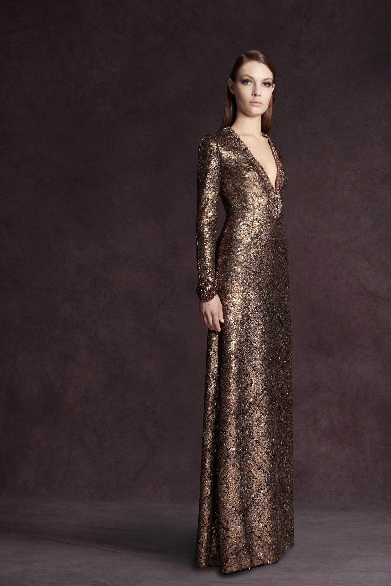 gold embellished long-sleeve gown