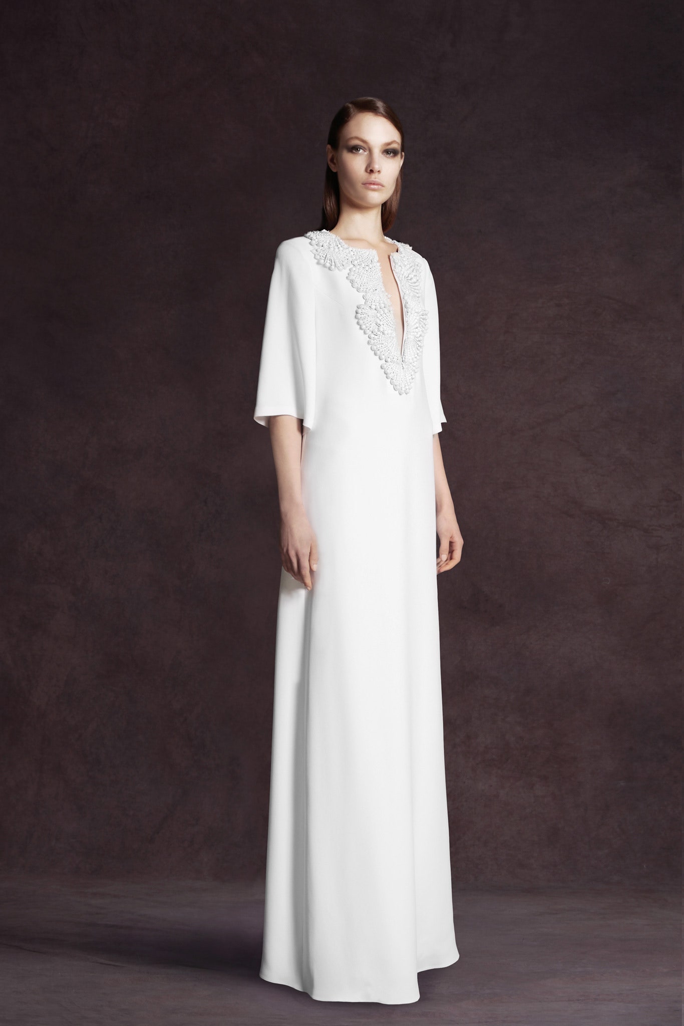 white silk embroidered gown