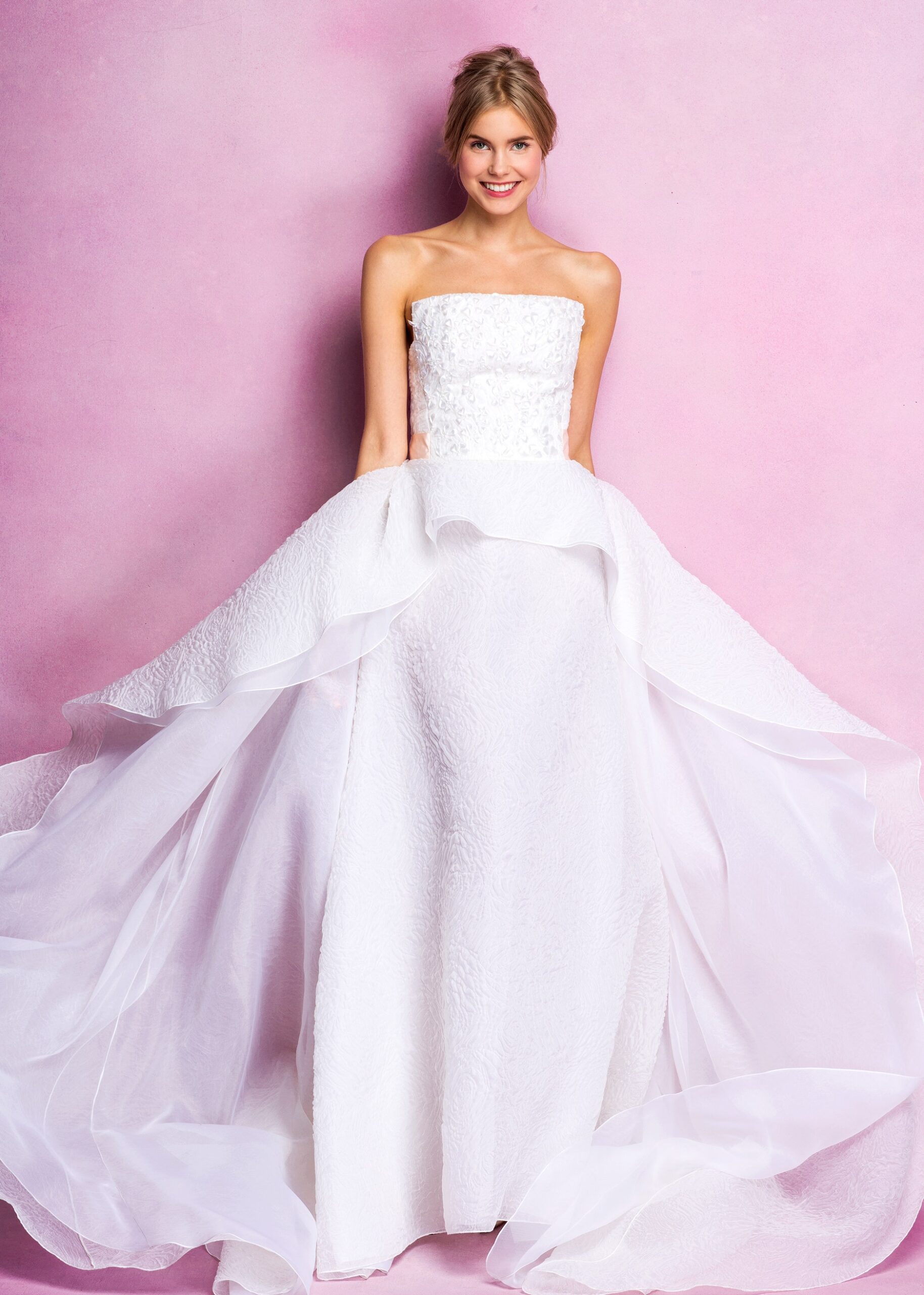 white strapless flowing gown