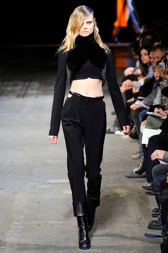 black fitted top and tailored pants