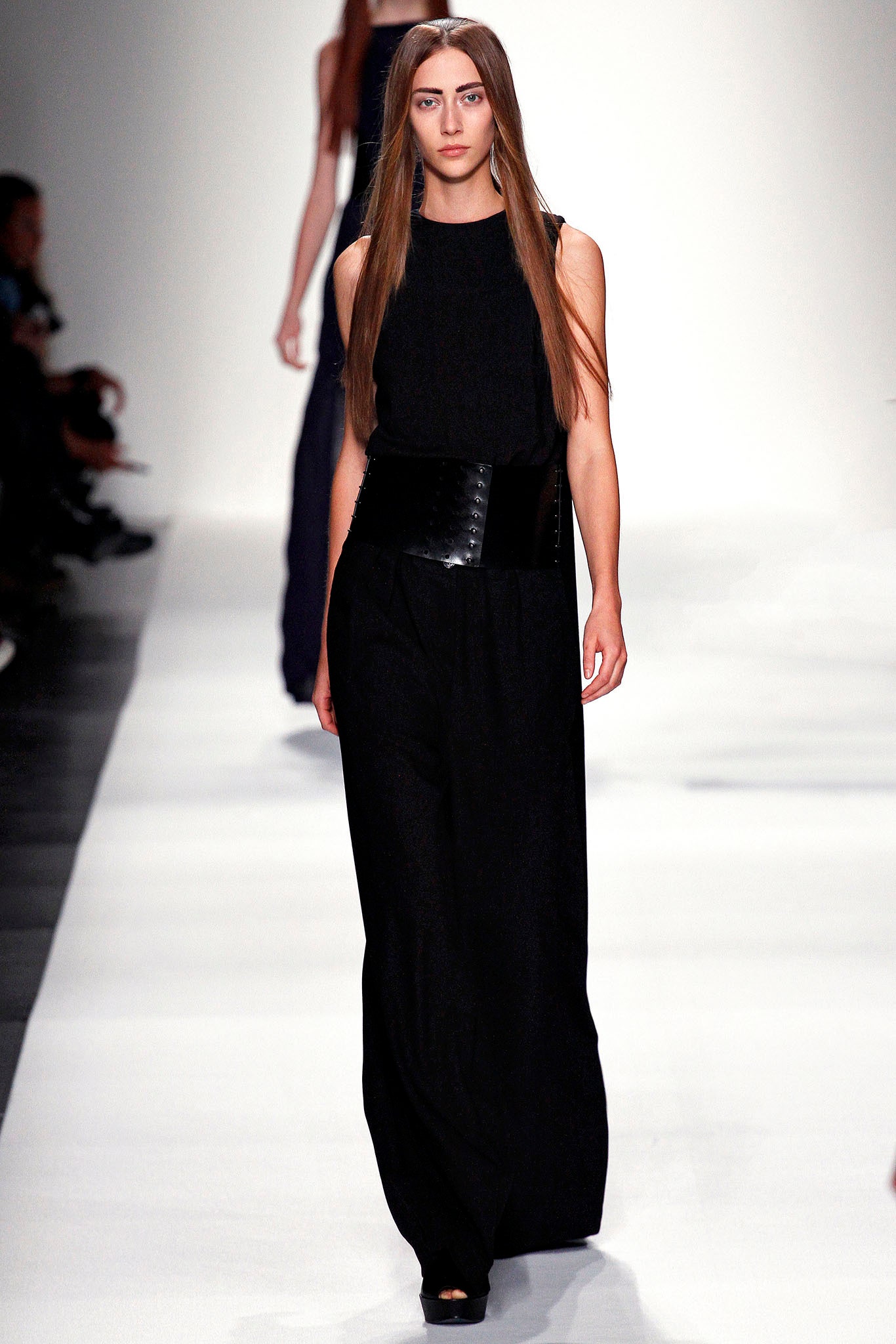 black fitted top and relaxed pants