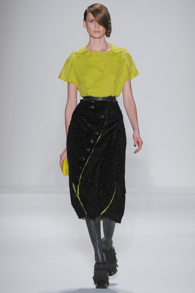 yellow silk top with black skirt