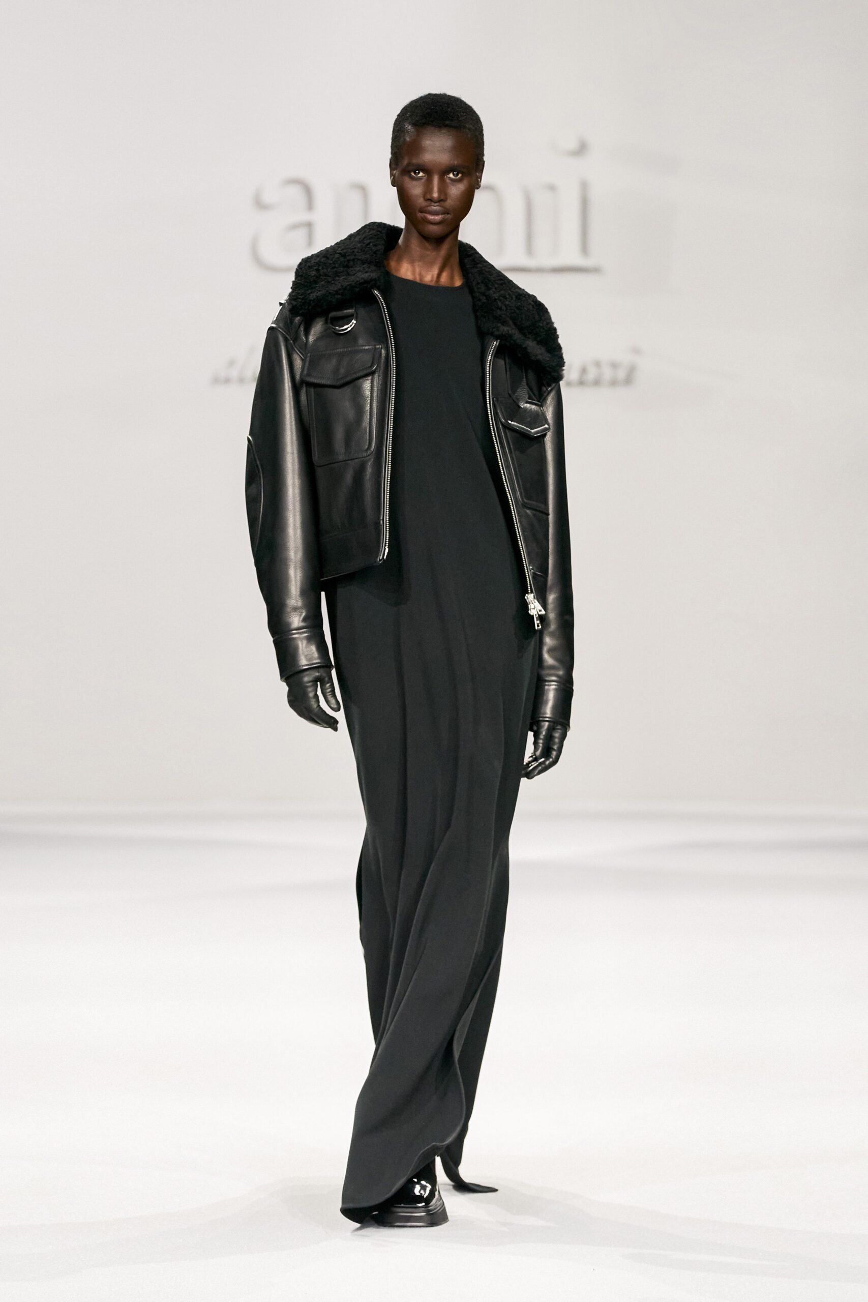 black leather jacket and black dress