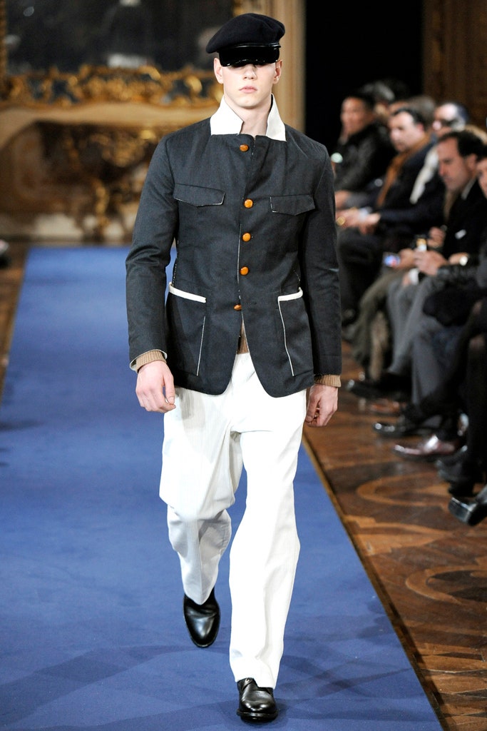 black fitted jacket with white pants