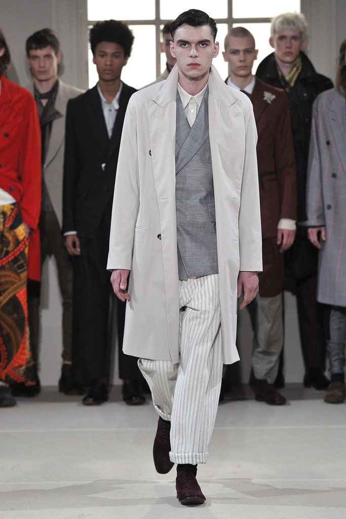 white coat gray blazer striped pants