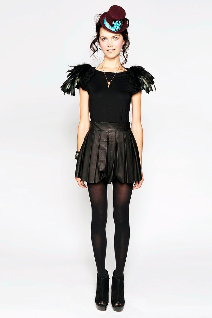 black fitted top with pleated skirt