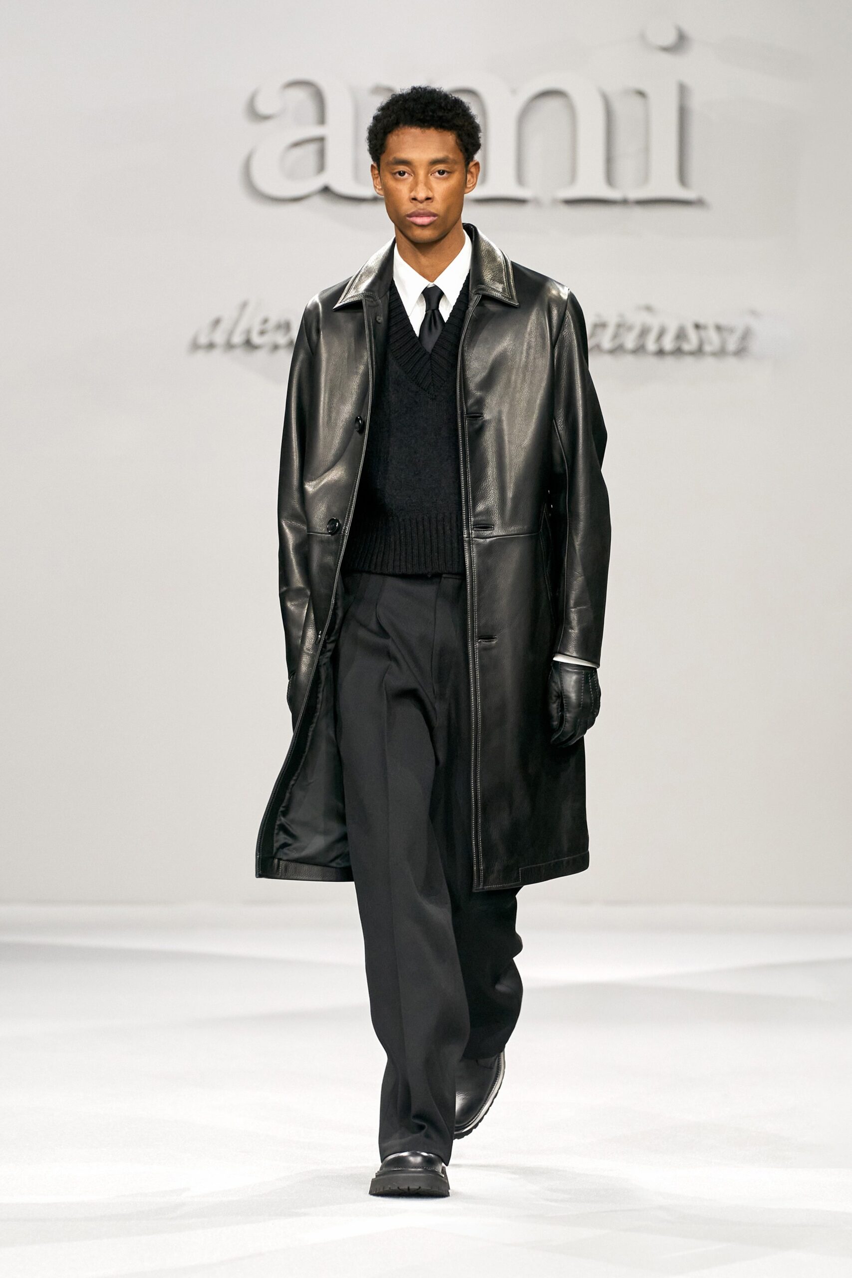 black leather coat with sweater