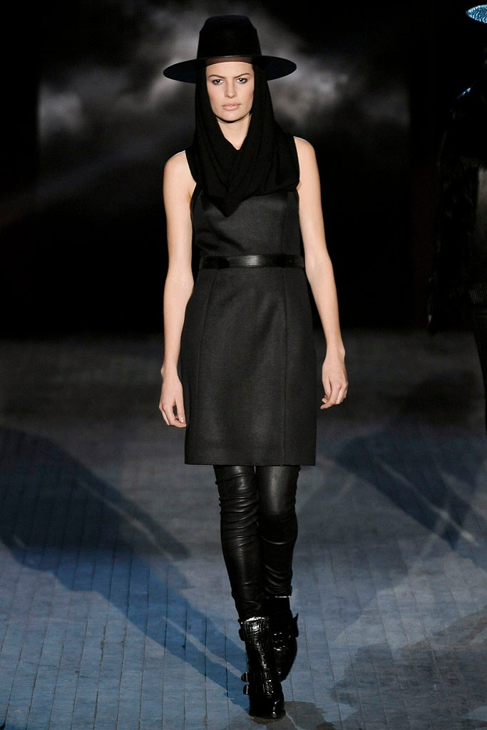 black wool sleeveless high-neck fitted belted a-line dress